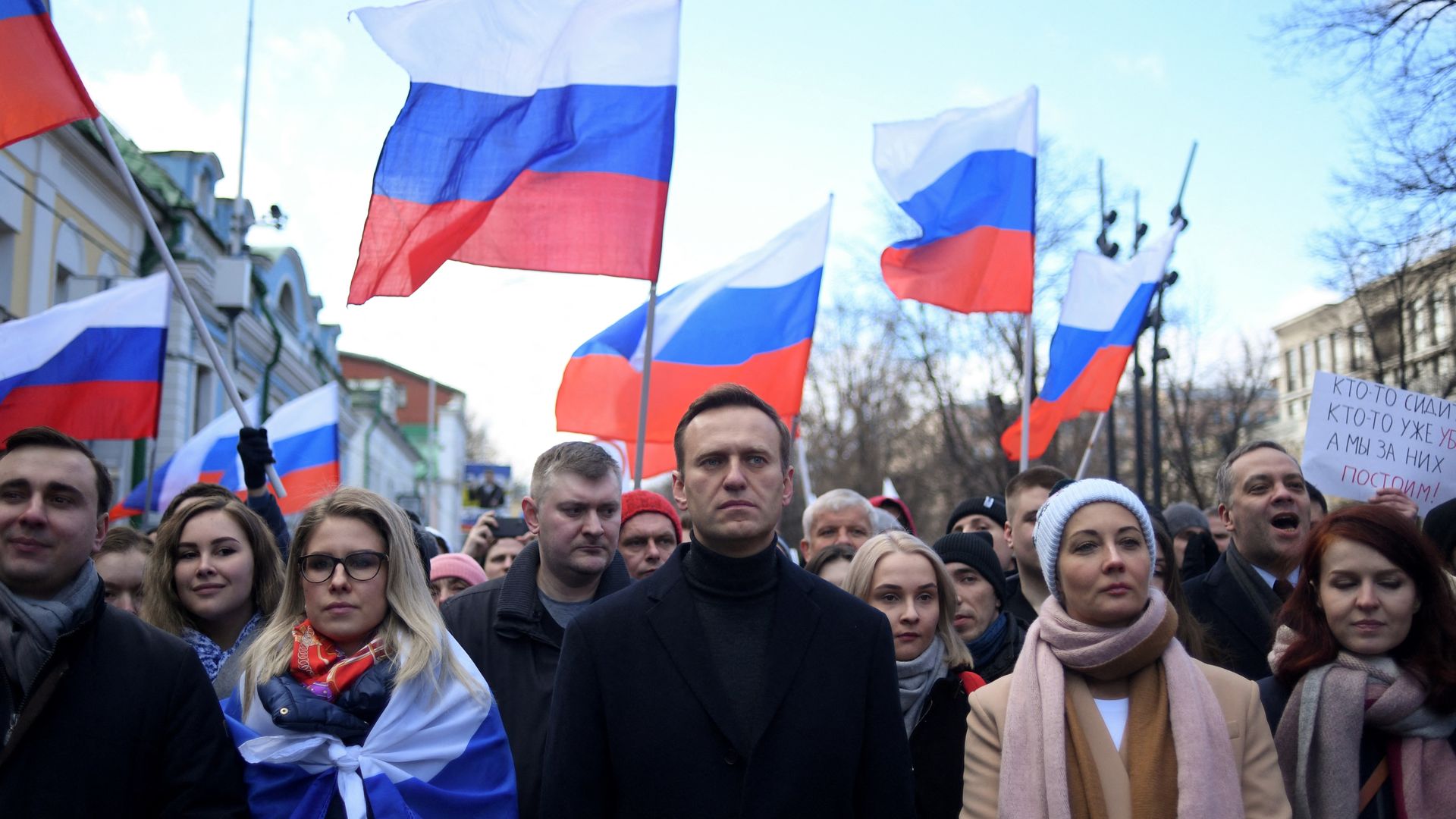 Alexei Navalny, his wife Yulia, opposition politician Lyubov Sobol and other demonstrators march in memory of murdered Kremlin critic Boris Nemtsov in downtown Moscow on February 29, 2020