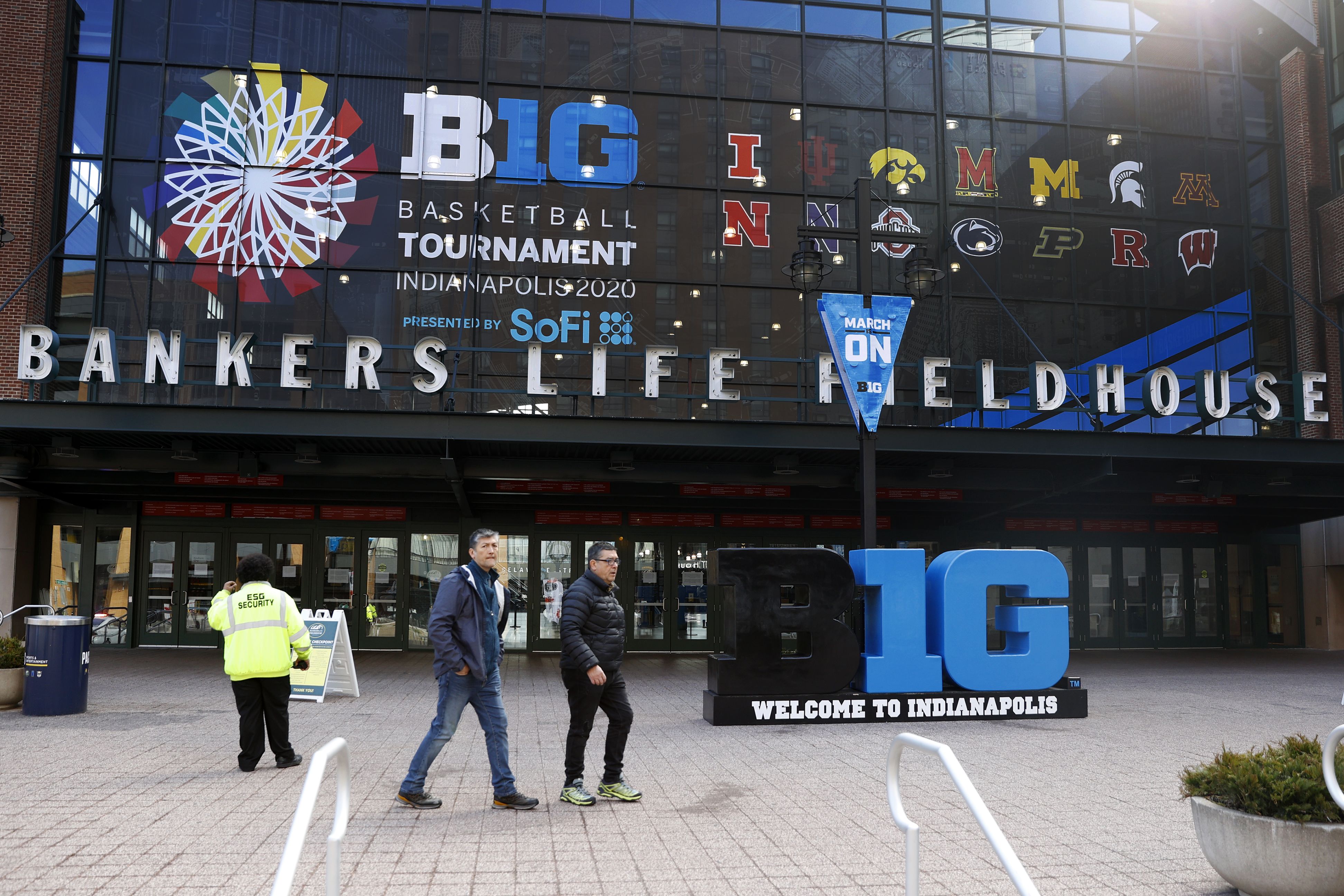 A pair of fans are turned away from entering the field house prior to the second round of the Big Ten Men's Basketball Tournament at Bankers Life Fieldhouse on March 12, 2020 in Indianapolis, Indiana. The Big Ten Conference announced that fans would not be allowed to attend the remainder of the tour
