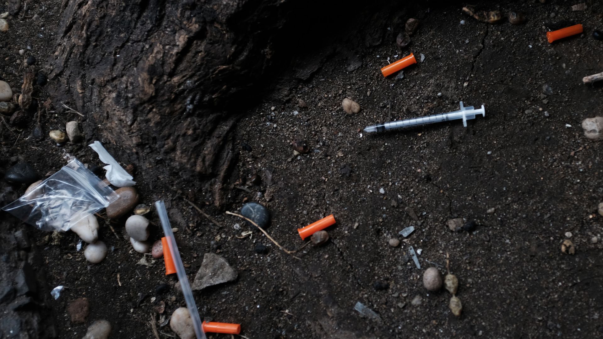 Hypodermic needles litter the ground in the South Bronx on March 13, 2019.