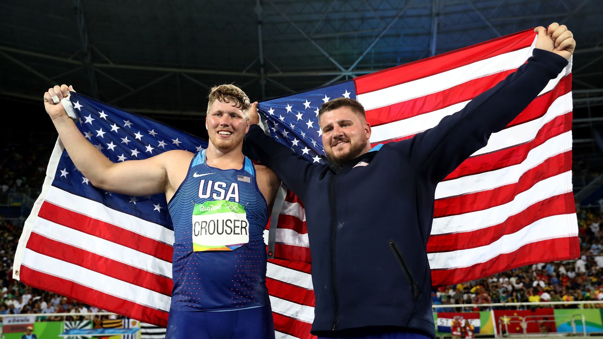 Ryan Crouser and Joe Kovacs celebrate after medaling at the 2016 Olympics