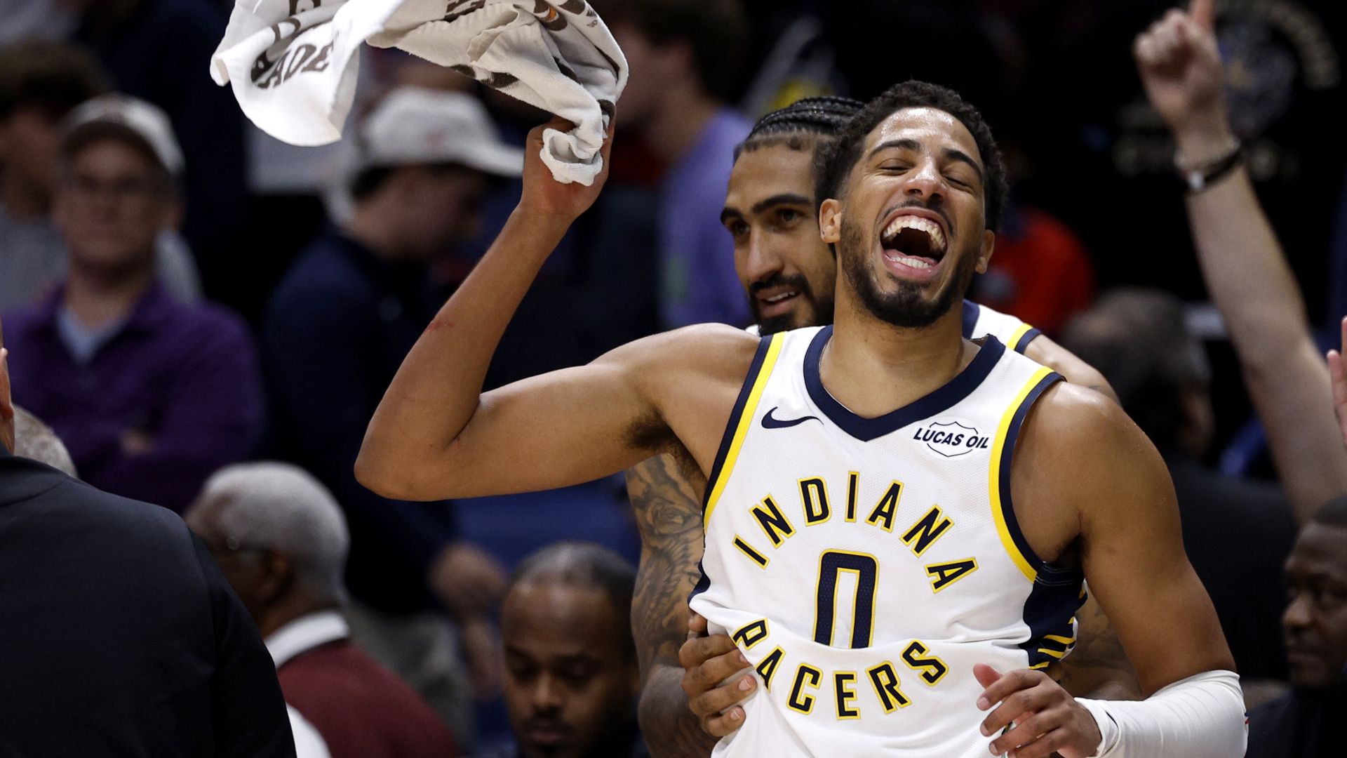 Tyrese Haliburton #0 and Obi Toppin #1 of the Indiana Pacers celebrate a 123-120 win over the New Orleans Pelicans at Smoothie King Center on October 21, 2026 in New Orleans, Louisiana.