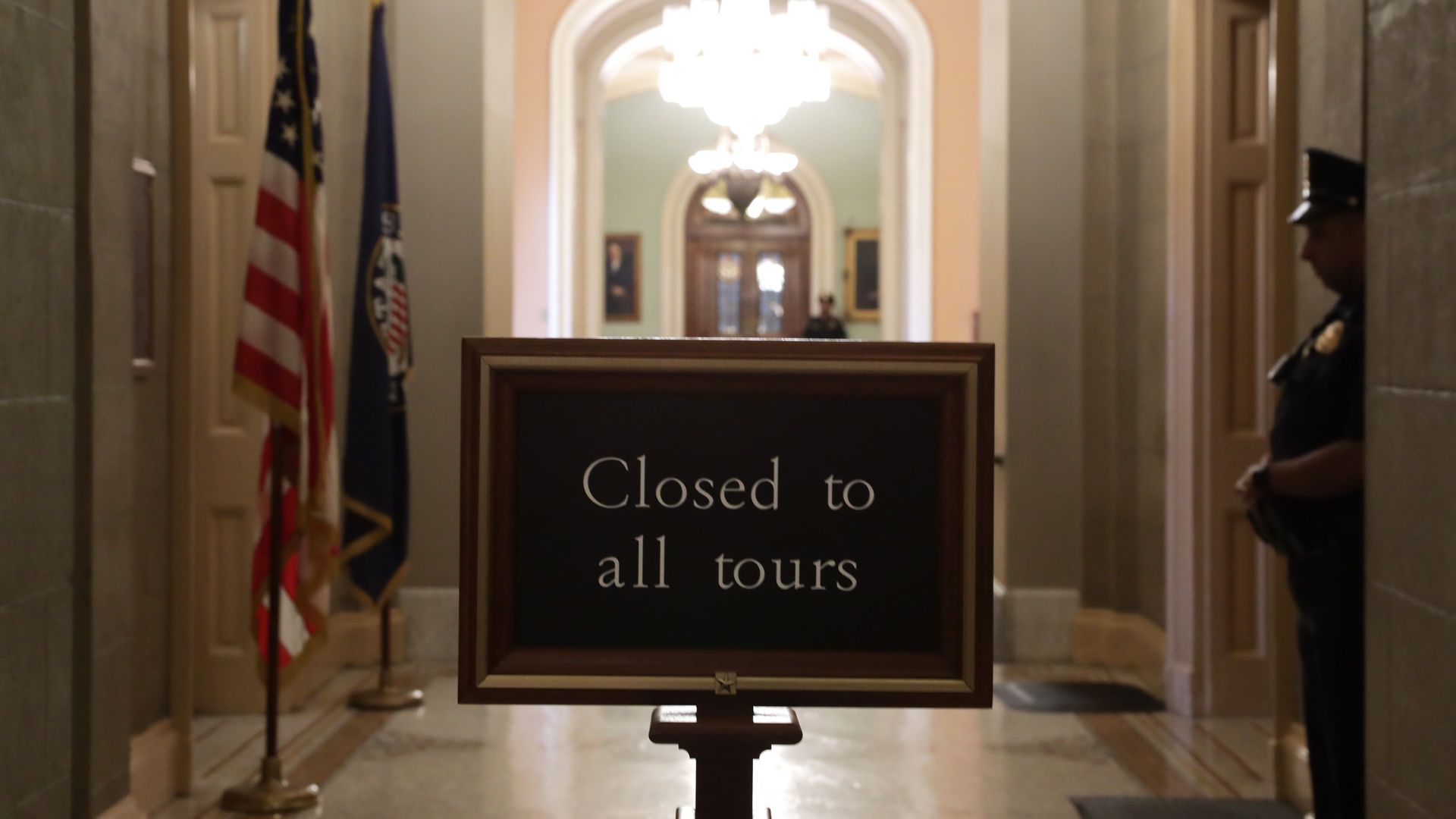 A "Closed to all tours" sign is posted at the U.S. Capitol 
