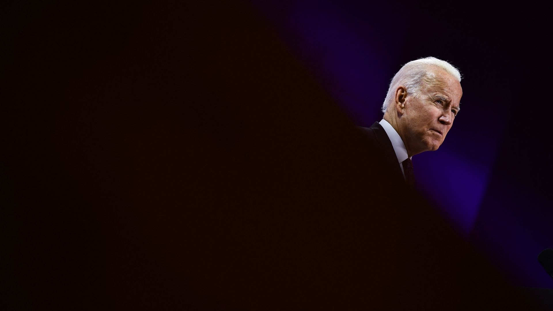 President Biden is seen addressing reporters in Rome.