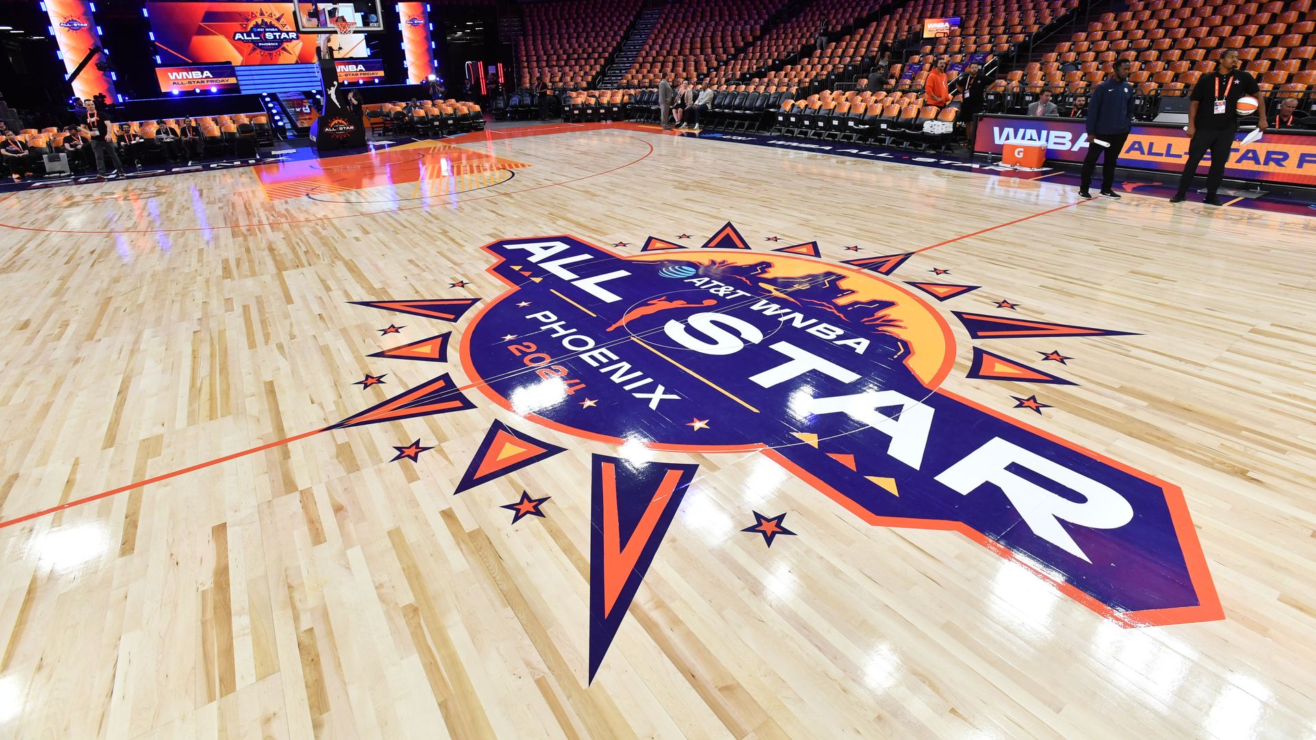 A basketball court that says, "WNBA All Star Phoenix."