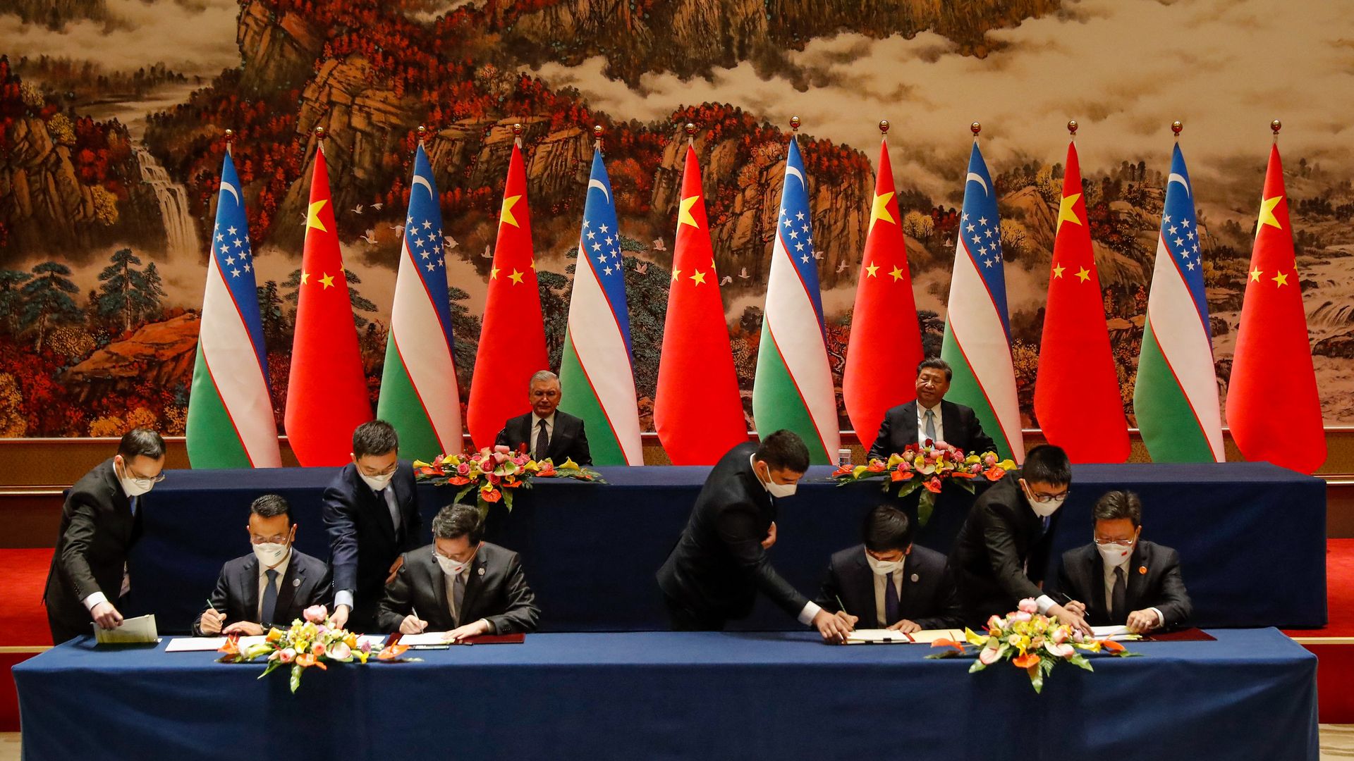 Chinese President Xi Jinping and Uzbekistan President Shavkat Mirziyoyev presides over a signing ceremony