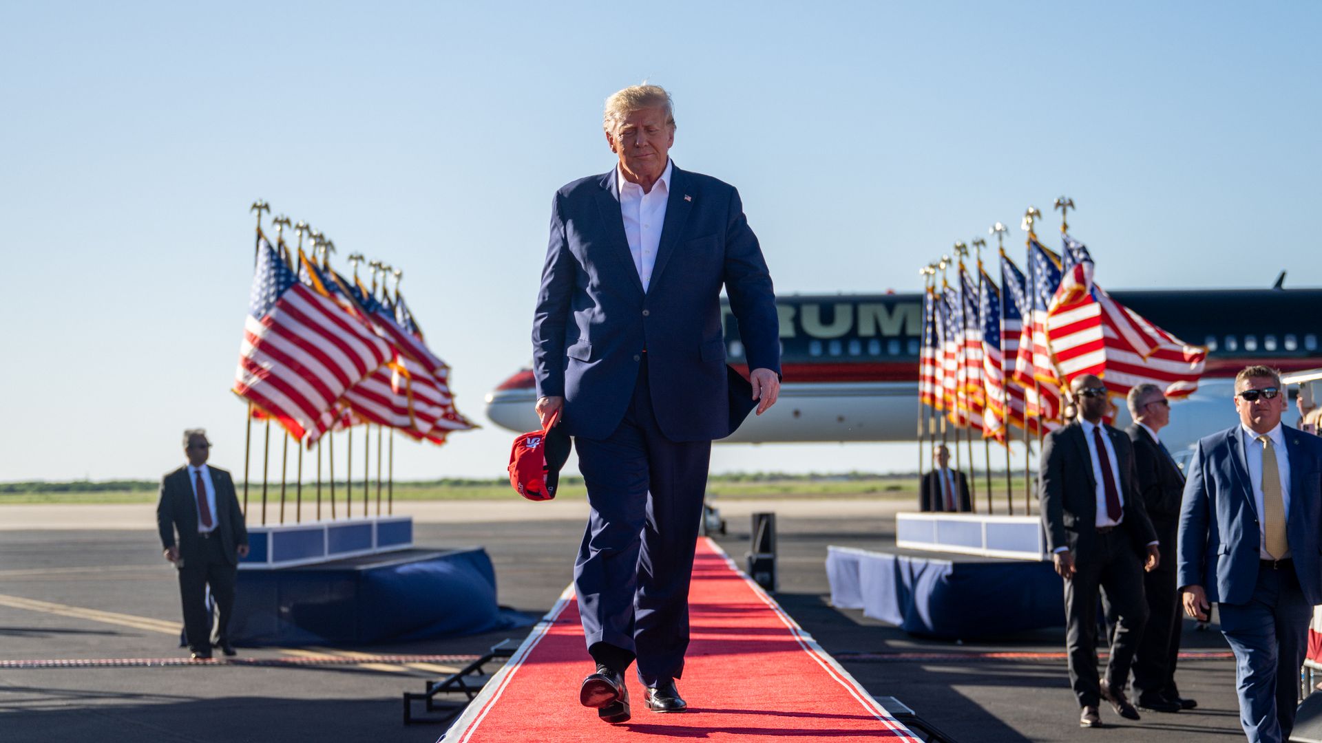 Former U.S. President Donald Trump arrives during a rally at the Waco Regional Airport on March 25, 2023 in Waco, Texas. 