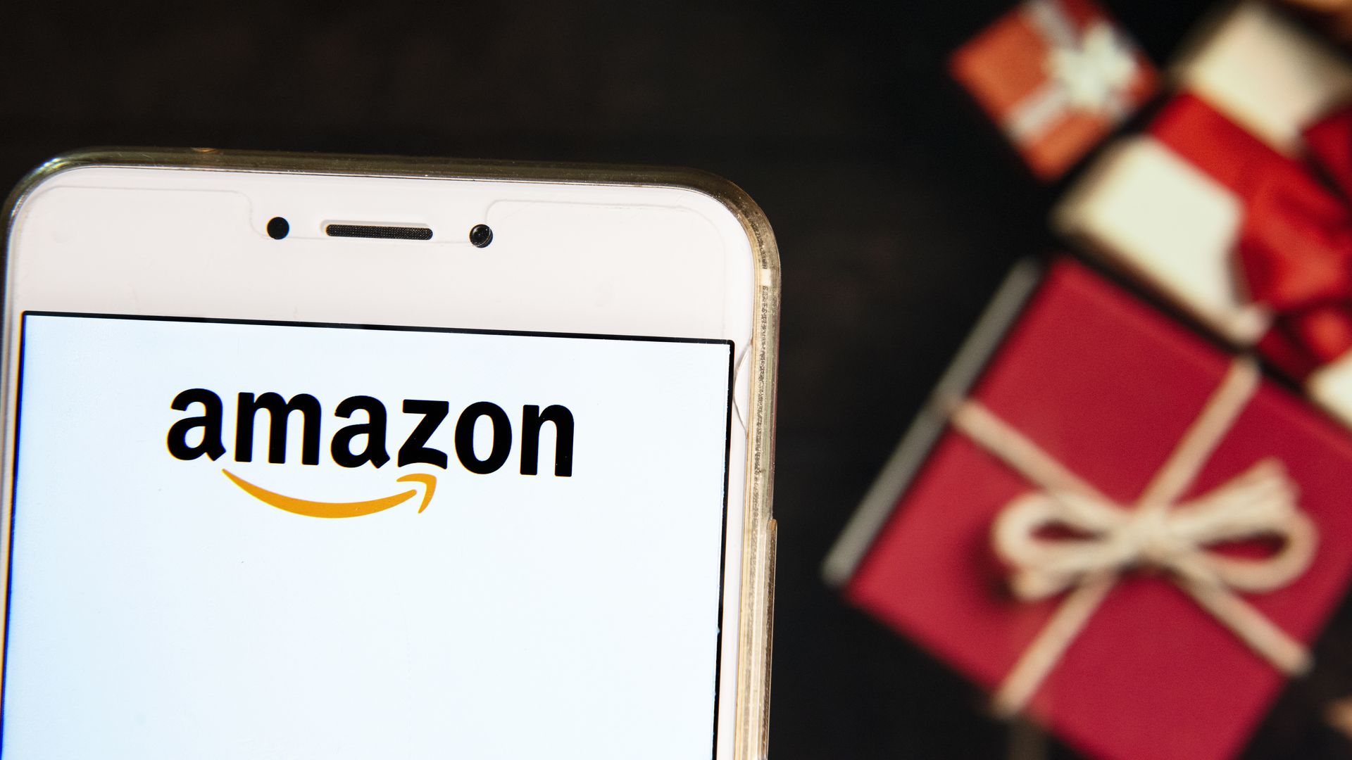 The Amazon logo on a phone screen