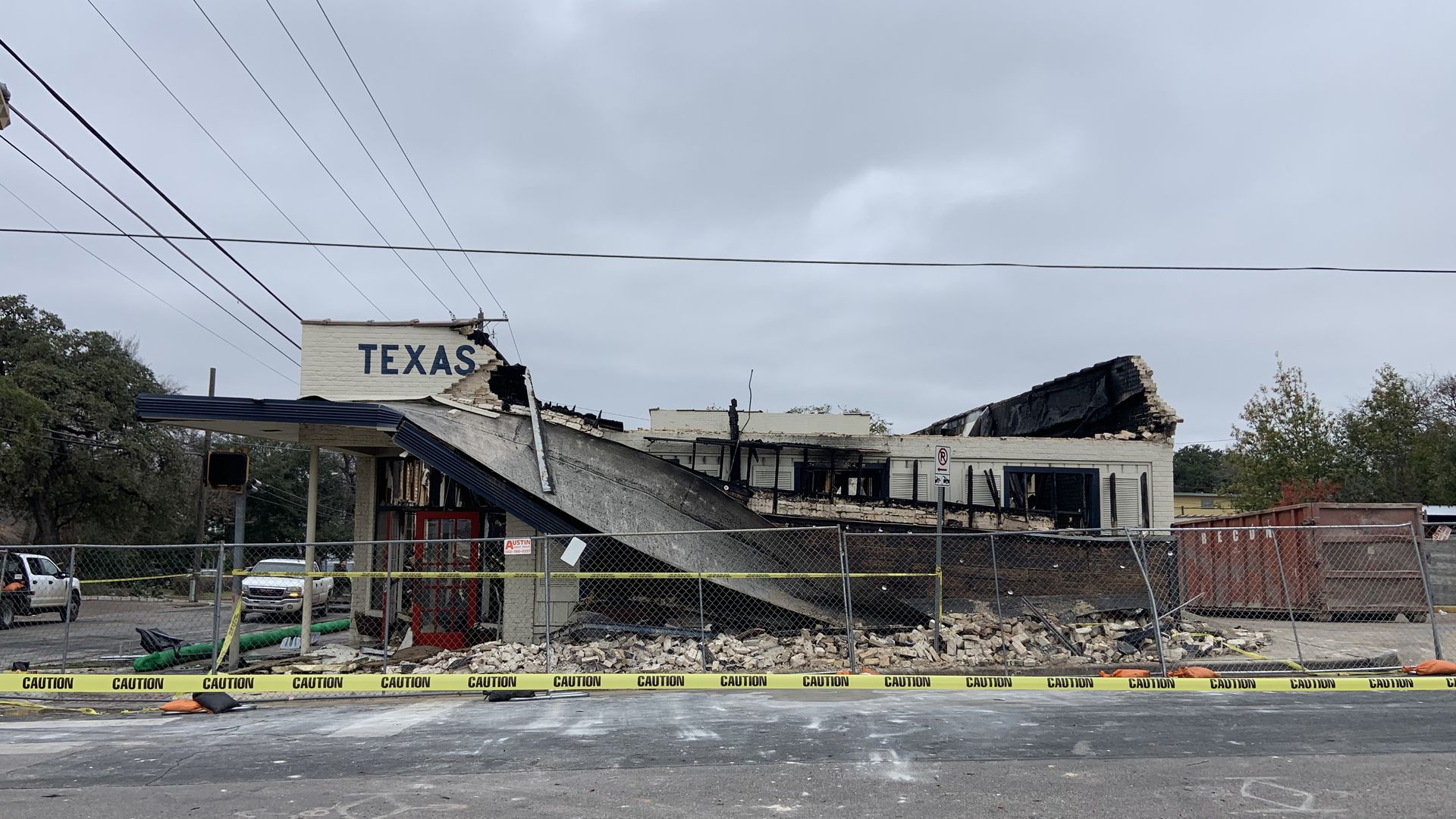 A photo of a destroyed building from a fire. 