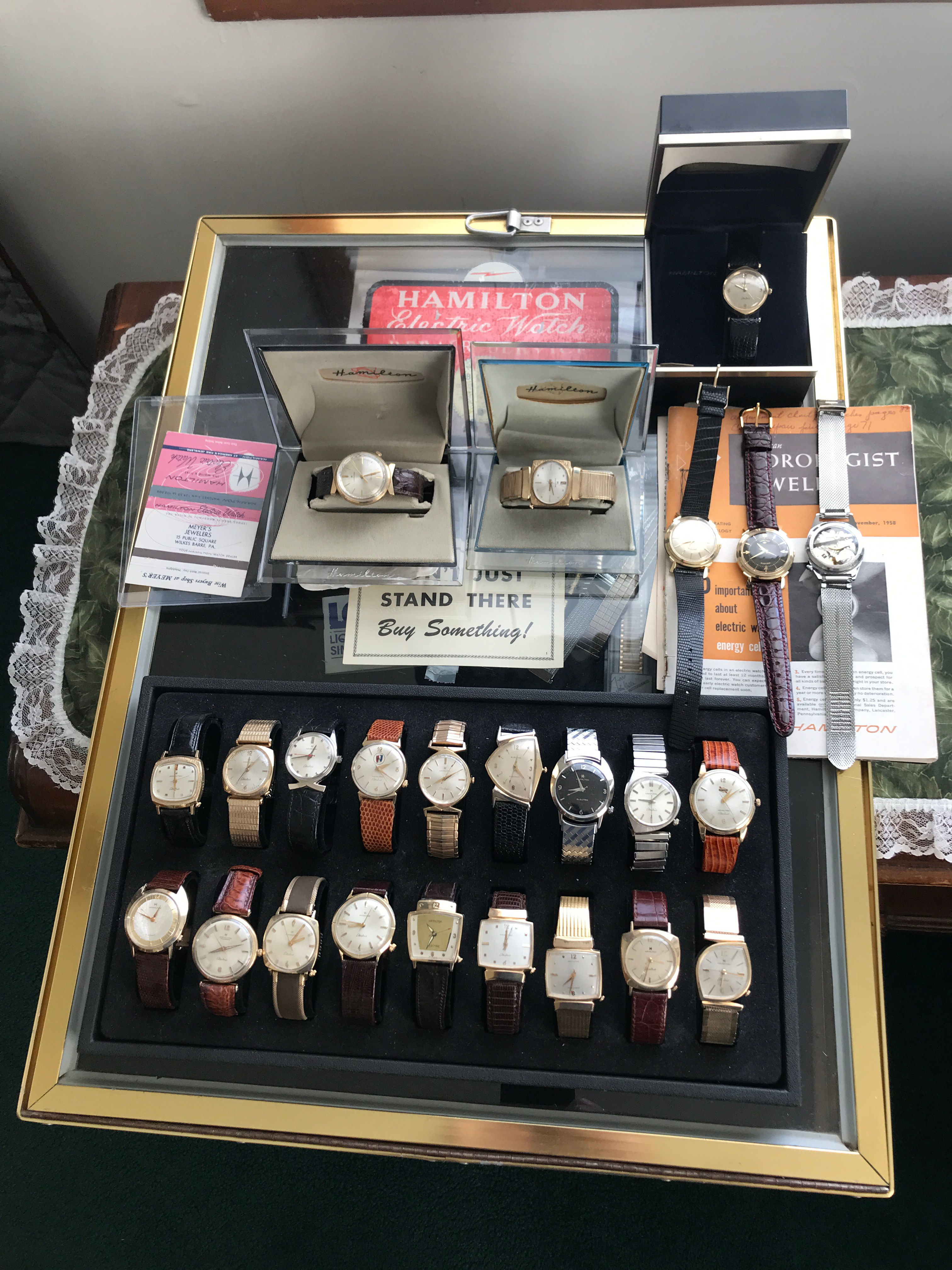 watch collection in gold trimmed case