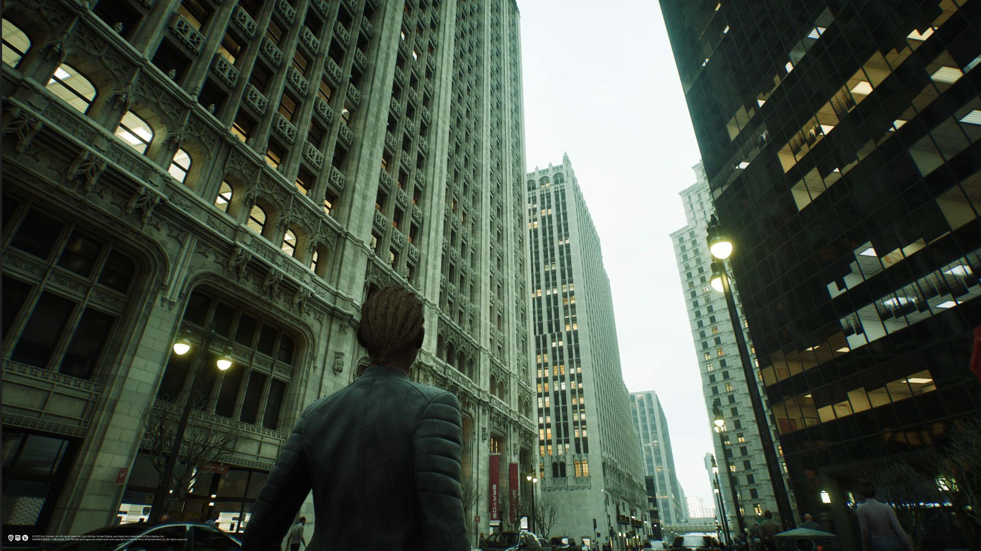 Screenshot of gameplay showing a person looking up at towering skyscrapers