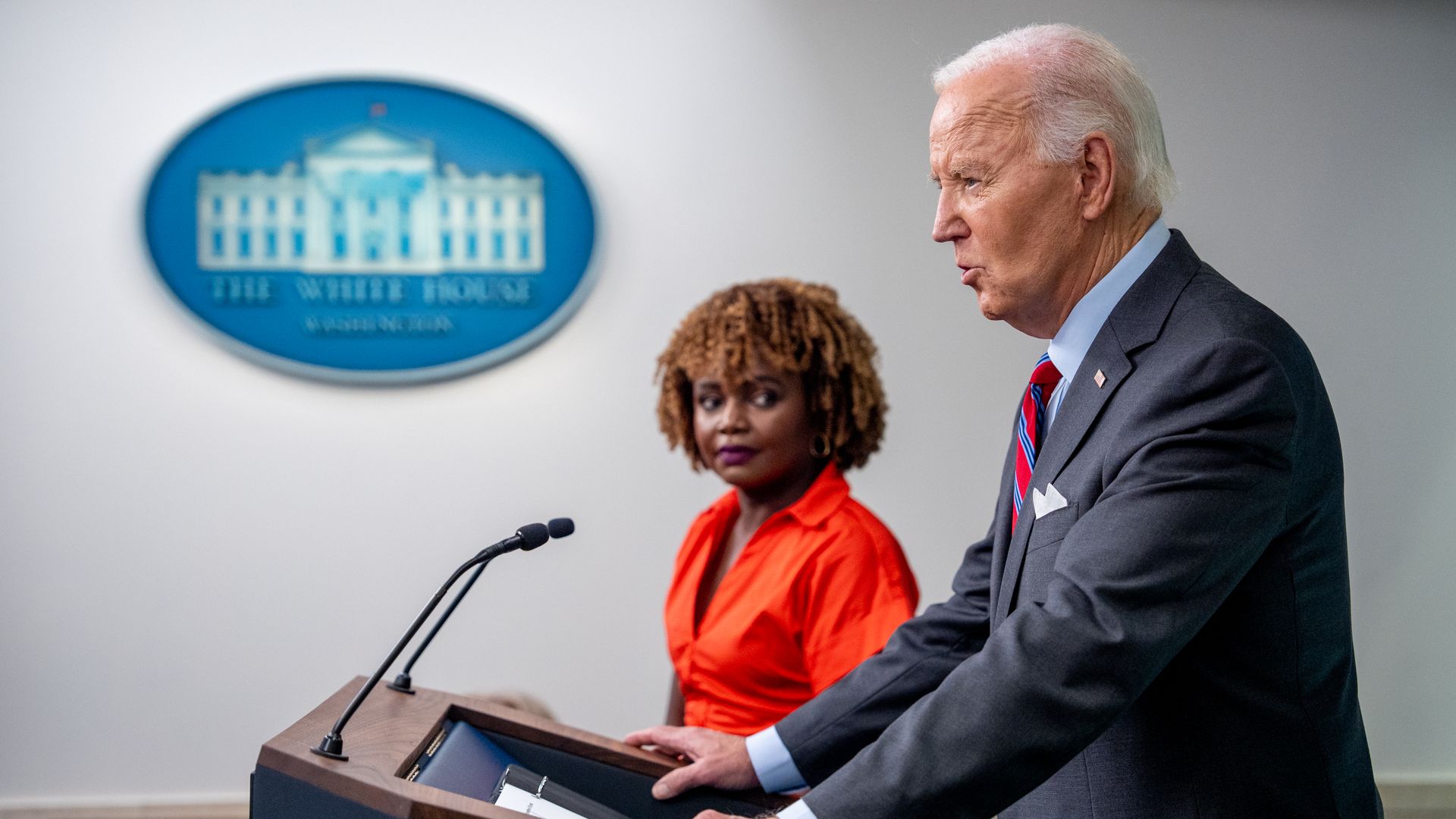 Biden, accompanied by White House press secretary Karine Jean-Pierre, speaks during a news conference in the Brady Press Briefing Room at the White House on October 04, 2024 in Washington, DC. Biden made a surprise appearance, his first in the briefing room since becoming president, to tout a positi