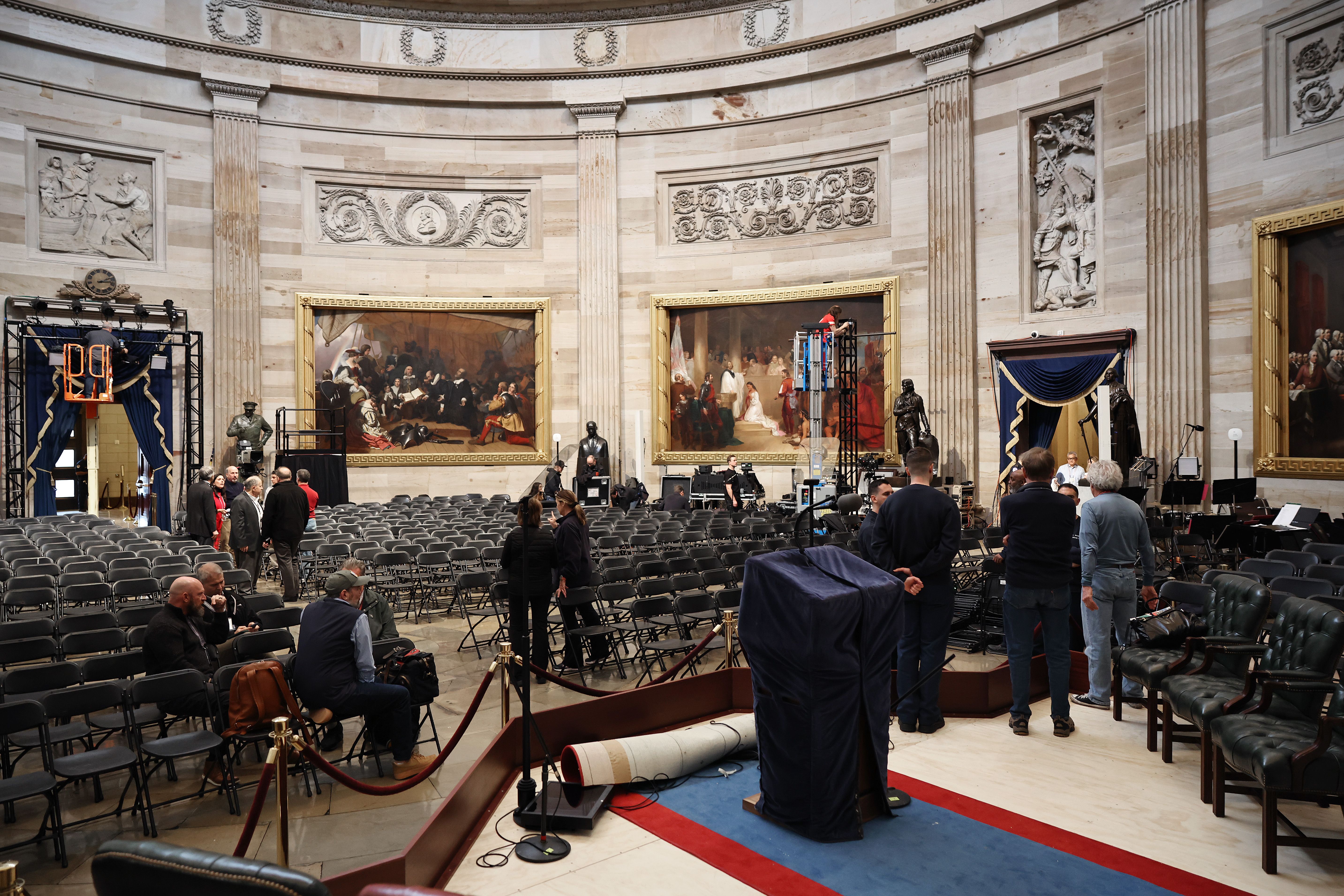 : Preparation work continues inside the U.S. Capitol Rotunda ahead of President-elect Donald Trump's inauguration ceremony on January 18, 2025 in Washington, DC. Trump and Vice President-elect Sen. JD Vance (R-OH) will take the oath of office indoors due to expected extreme cold temperatures on Janu