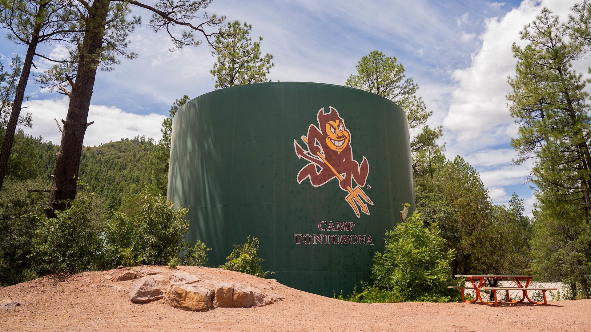A water tank with Sparky the Sun Devil painted on it. 