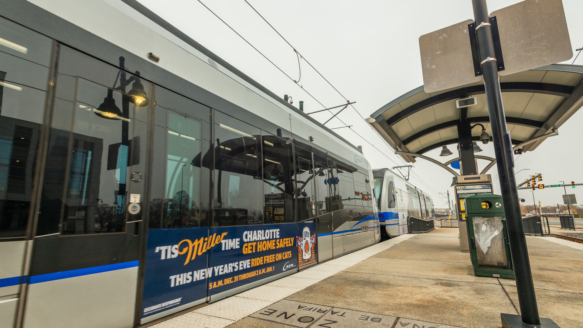 Light rail car with Miller Lite ad on the side