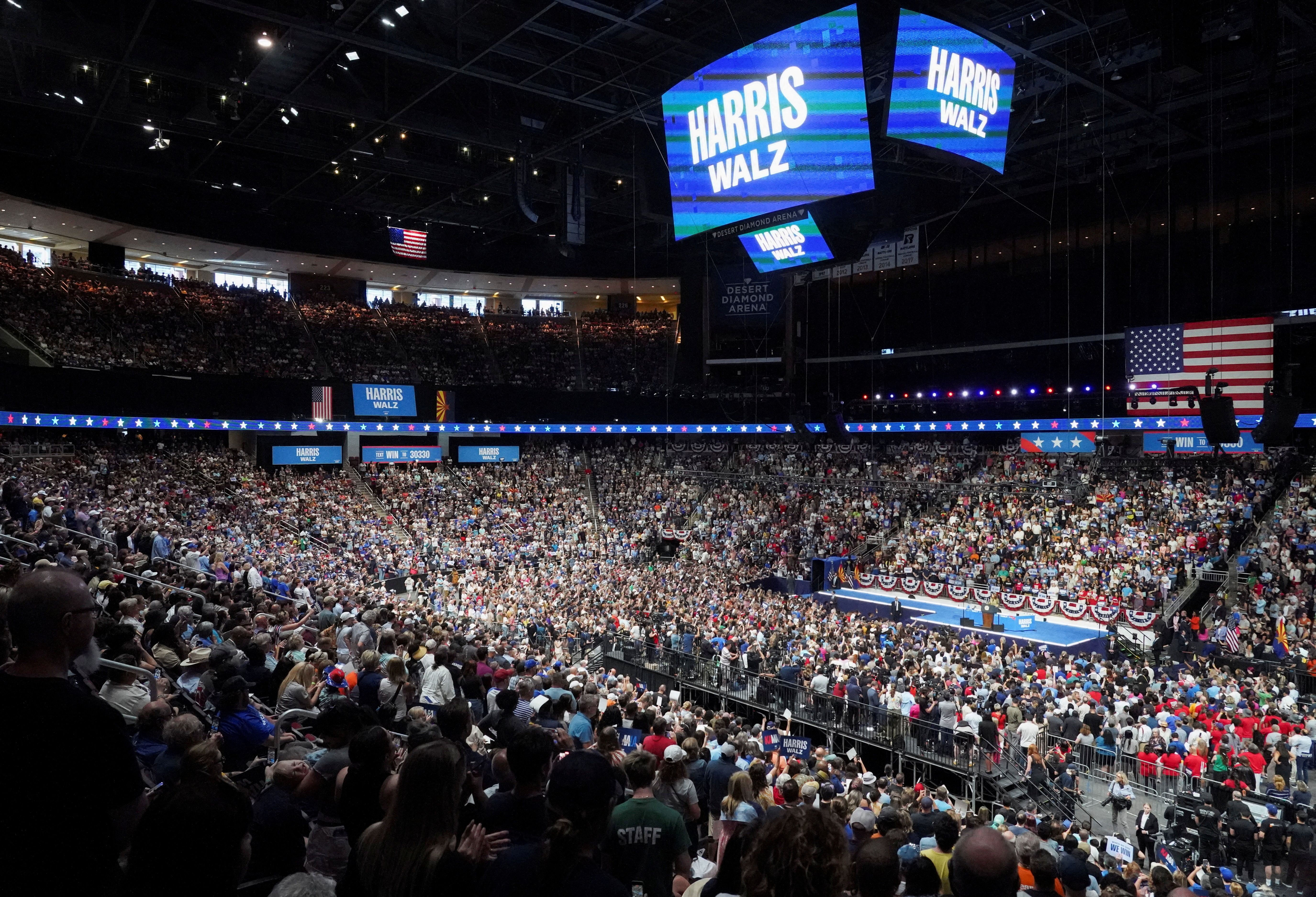  Vice President and Democratic presidential candidate Kamala Harris attends a campaign rally held along with Democratic vice presidential candidate, Minnesota Governor Tim Walz, in Glendale, Arizona, U.S., August 9, 2024. REUTERS/Go Nakamura 