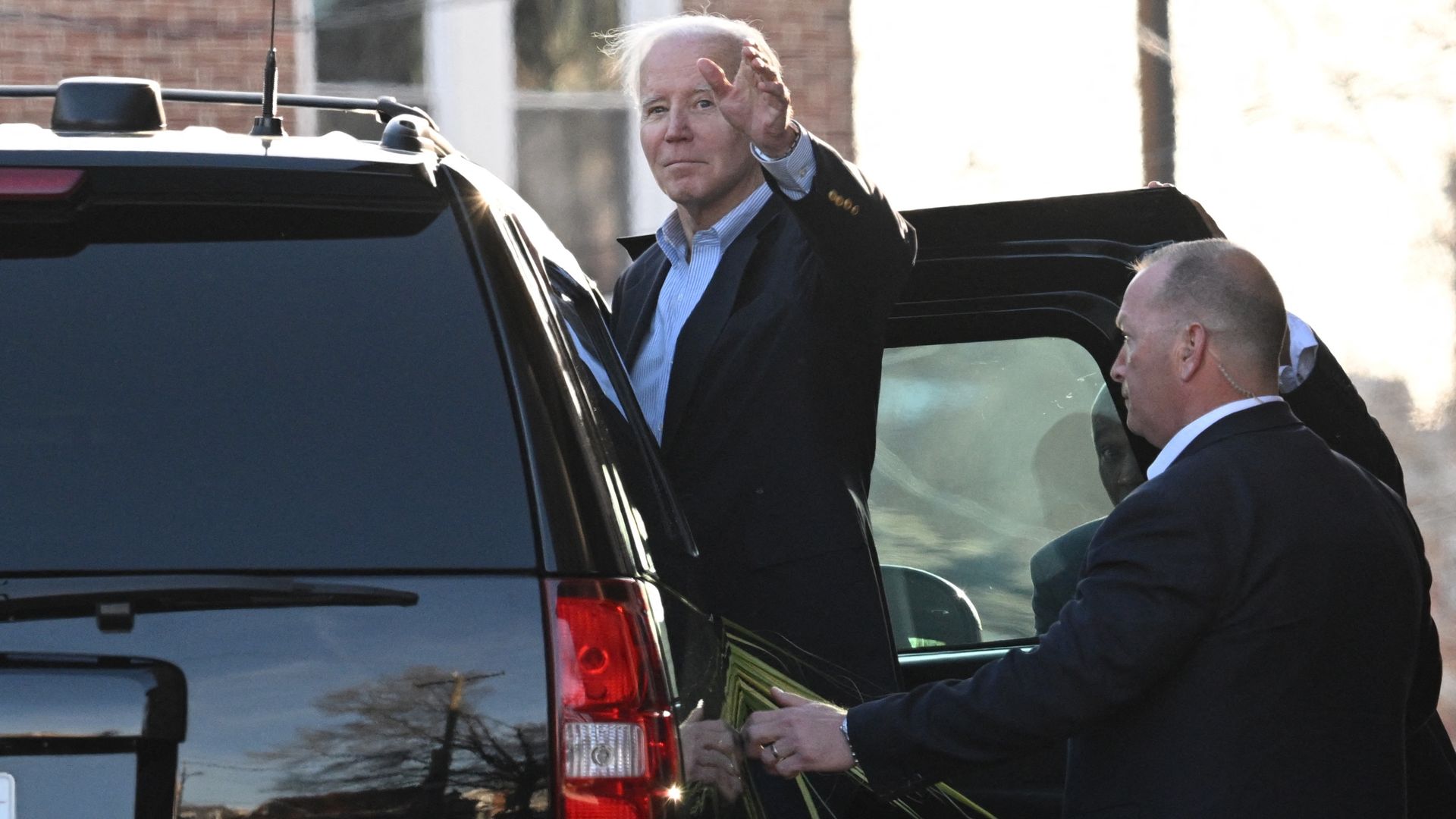 President Biden leaves a Palm Sunday service at St. Anthony of Padua Roman Catholic Church in Wilmington, Del., yesterday.