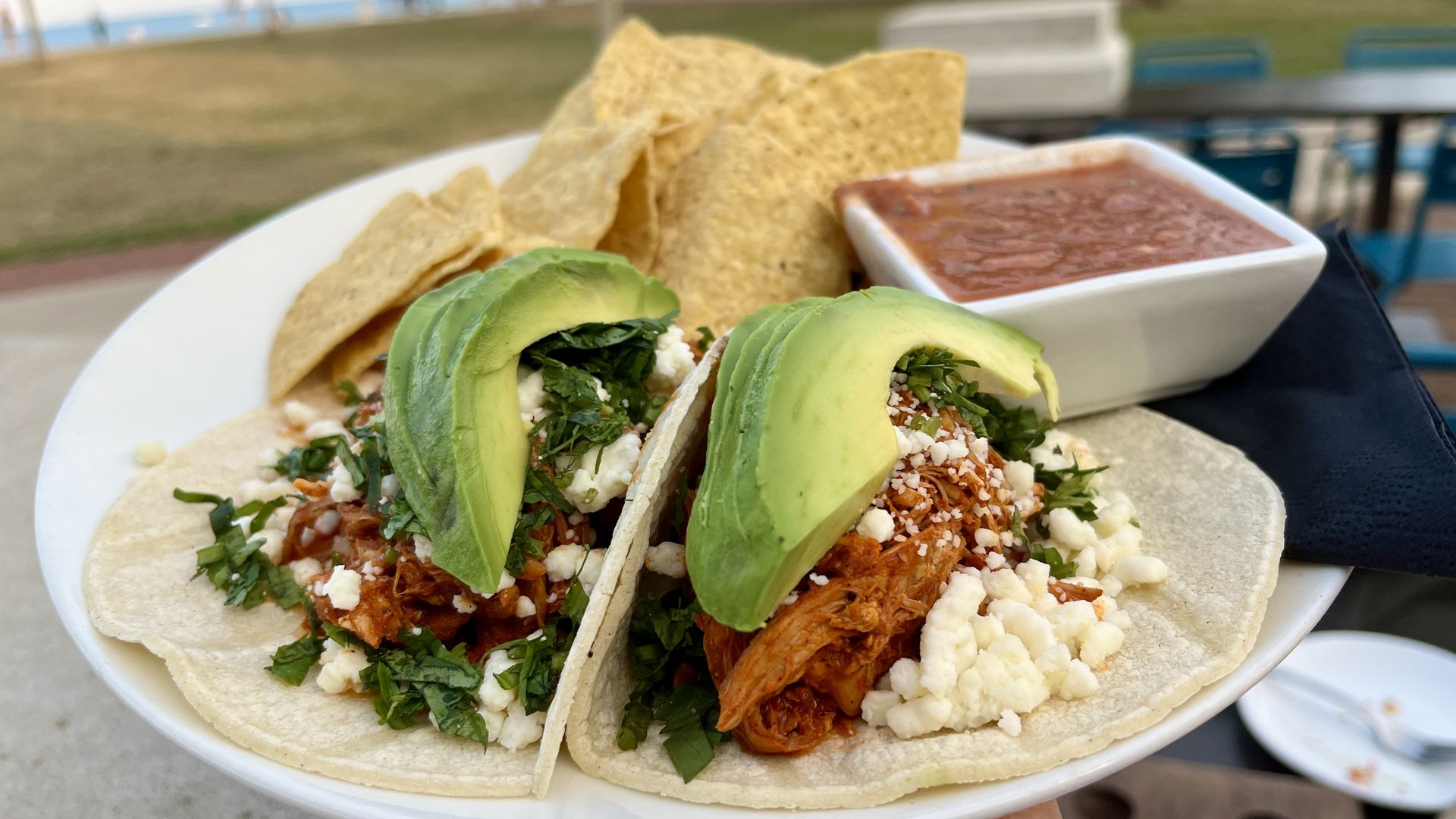 tacos with avocado on top 