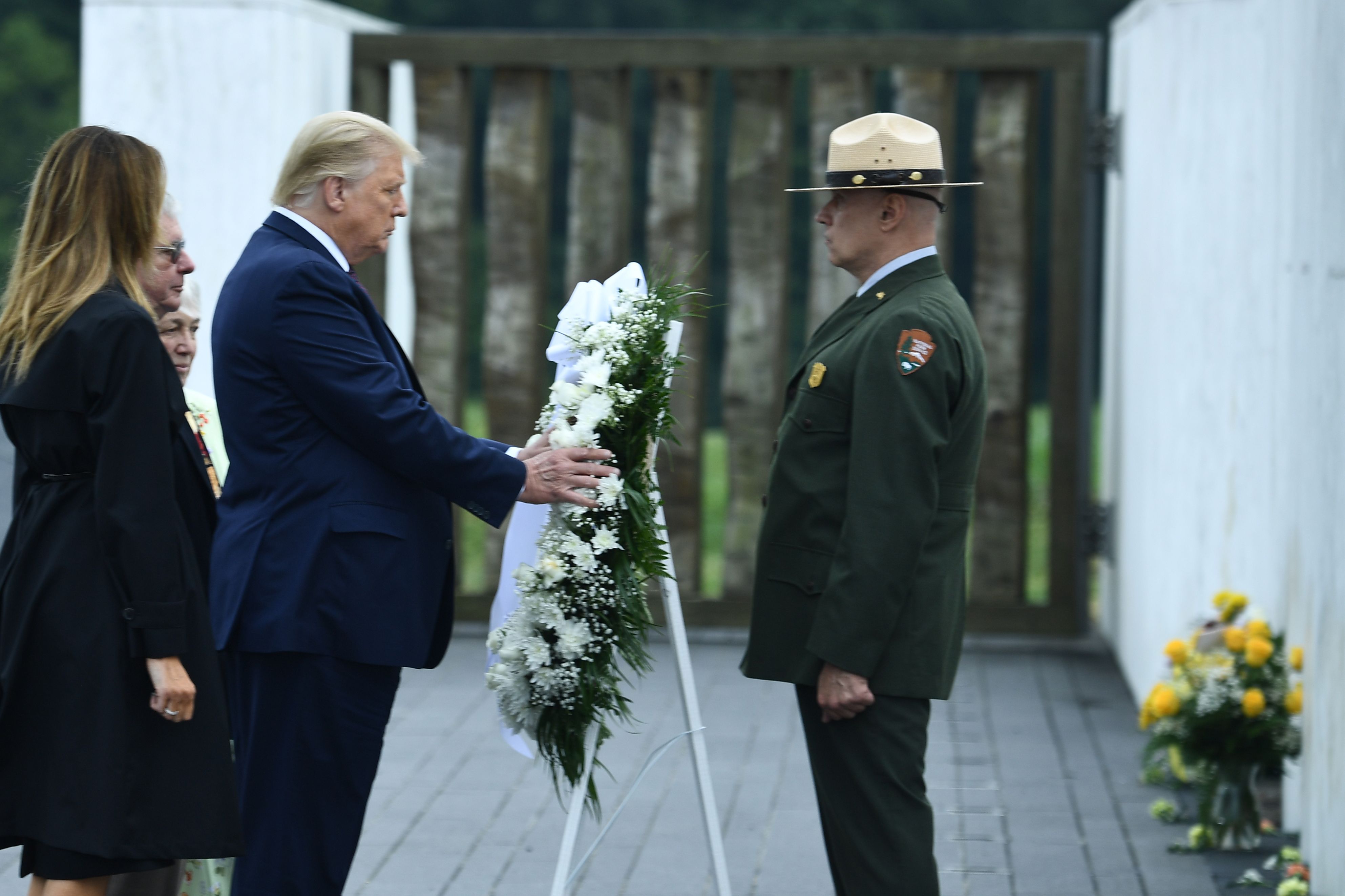 President Trump and First Lady Melania Trump laying a wreath during a ceremony commemorating the 19th anniversary of the 9/11 attacks, in Shanksville, Pennsylvania.