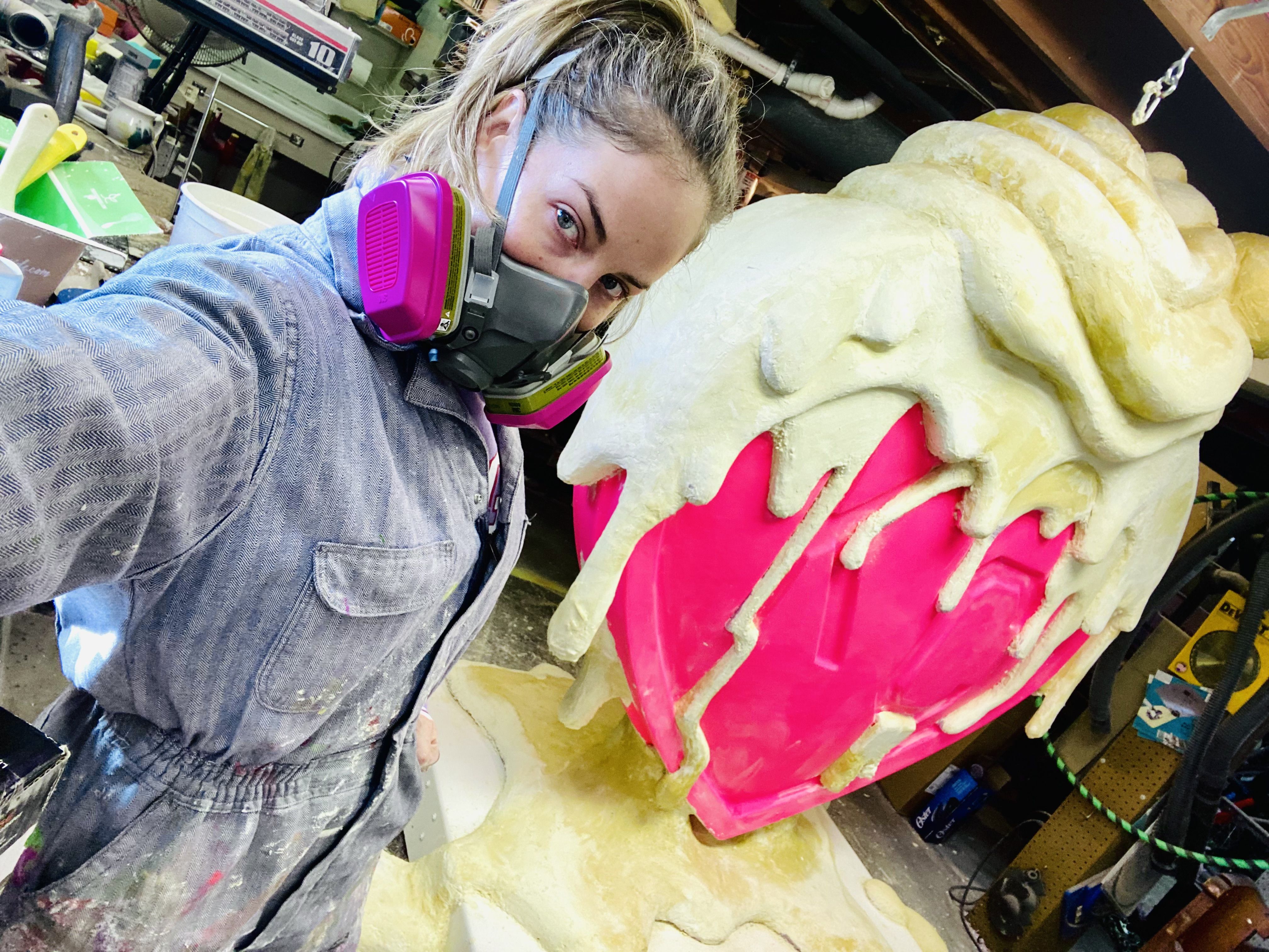 Artist Trew Love working on her 2022 heart for the Parade of Hearts project. 