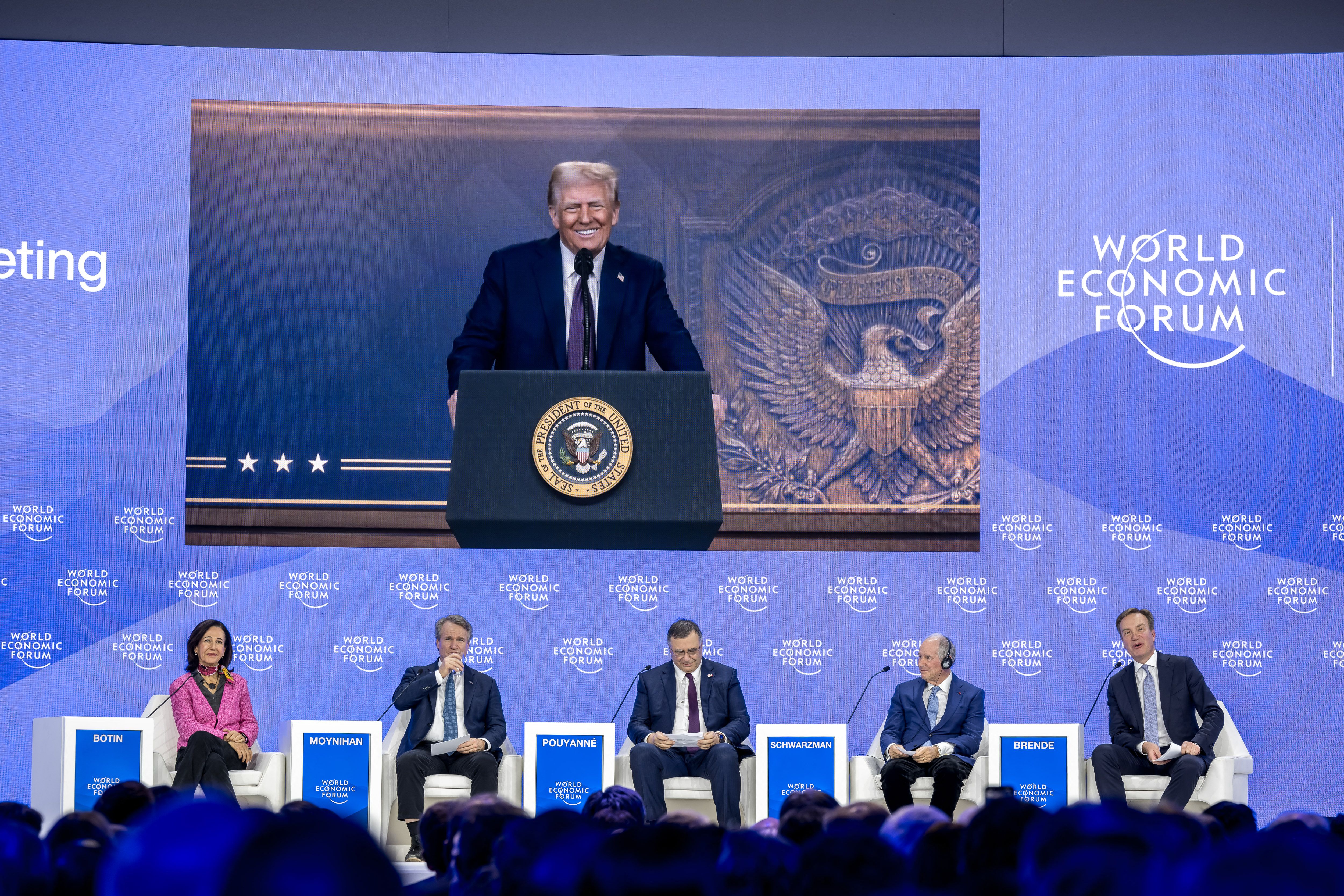 President Trump is seen on a giant screen during his address by video conference at the World Economic Forum (WEF) annual meeting in Davos on January 23, 2025.