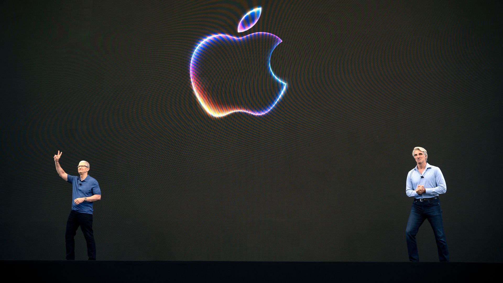 Apple CEO Tim Cook (L) and senior vice president of software engineering Craig Federighi during an Apple event Monday. Photo: David Paul Morris/Bloomberg via Getty Images