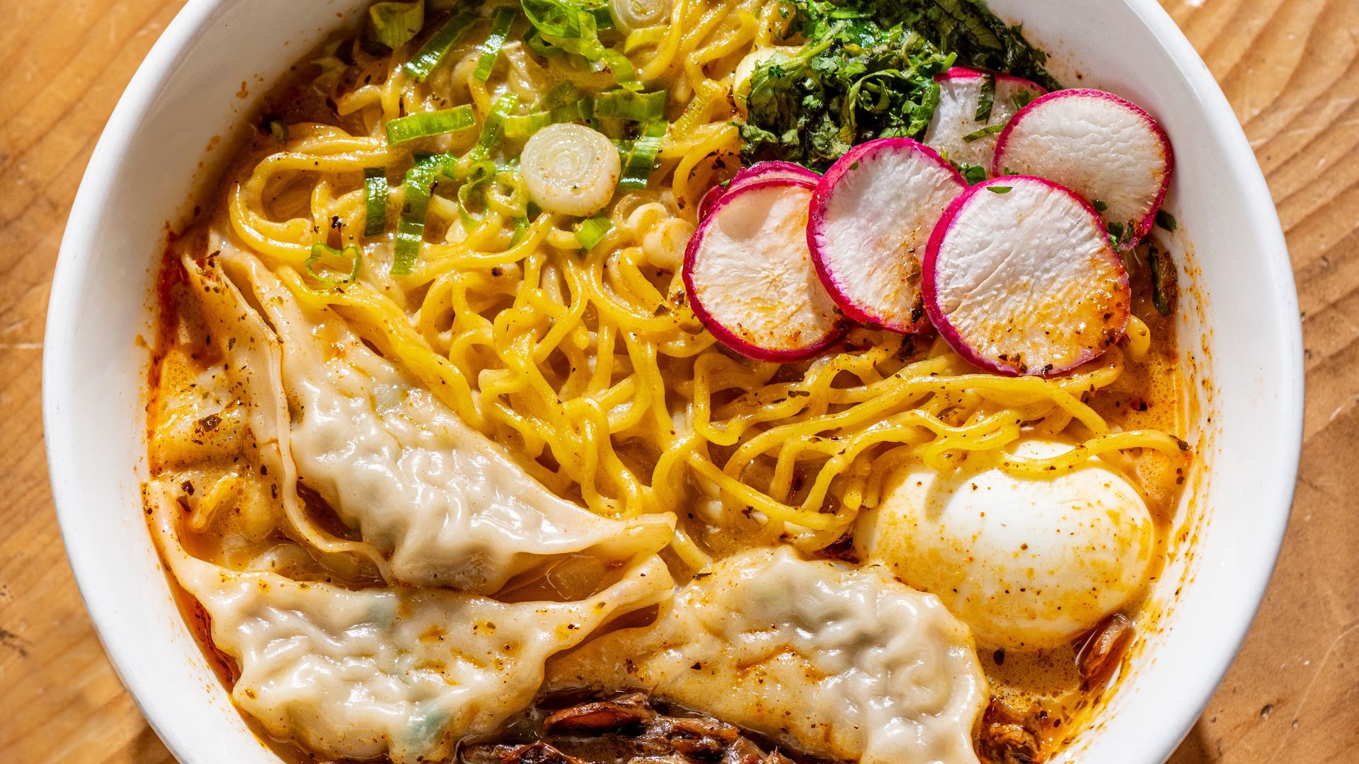 Bowl of noodles and dumplings