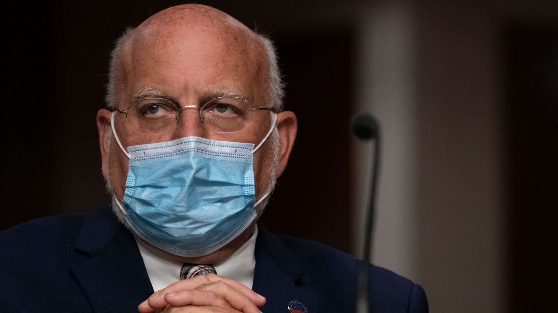 CDC director Robert Redfield wears a face mask