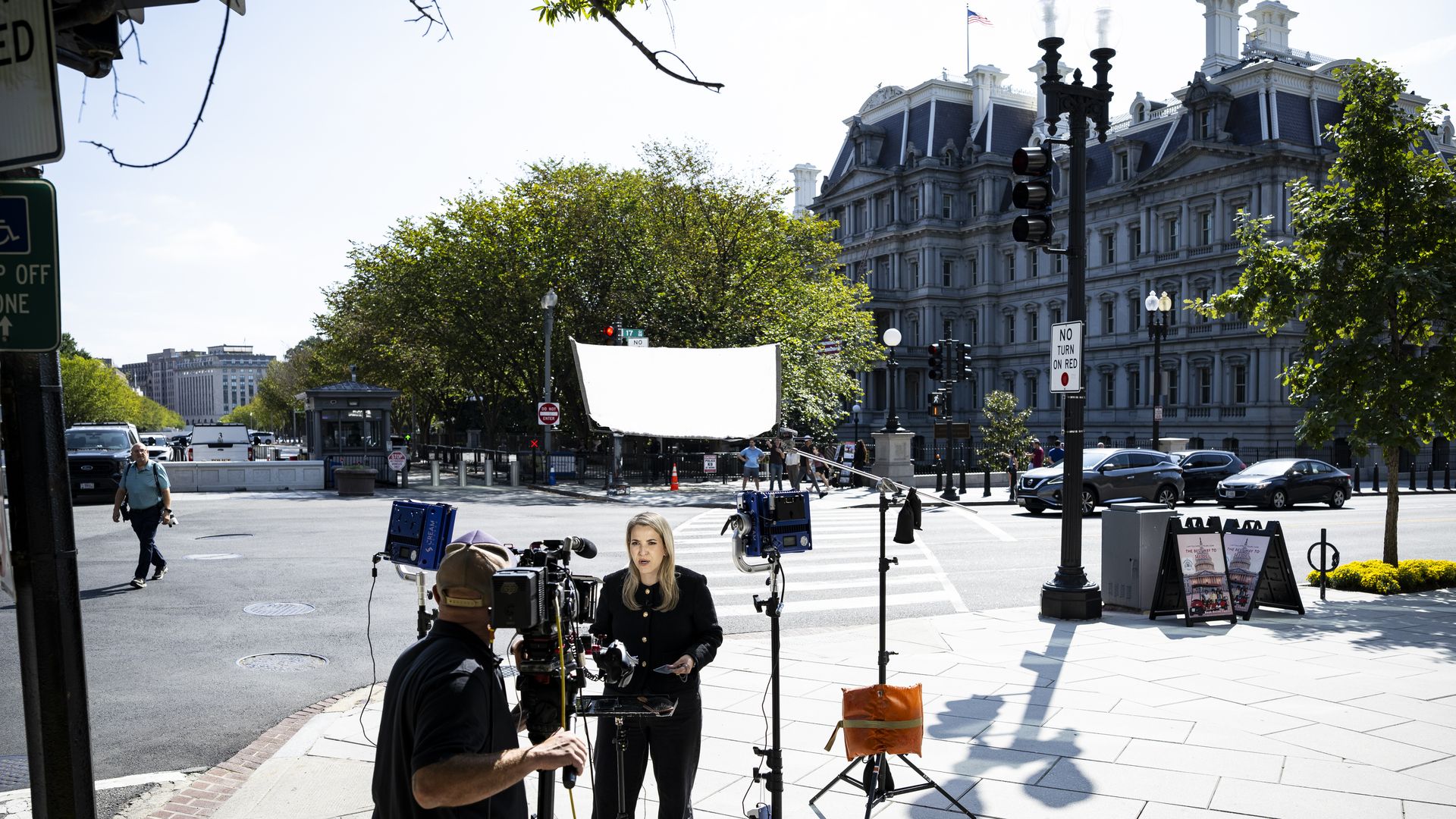 CNN senior White House reporter Betsy Klein during a television report on a street corner outside the White House grounds after earlier being denied entry, on Sept. 19, 2026 in Washington, DC.