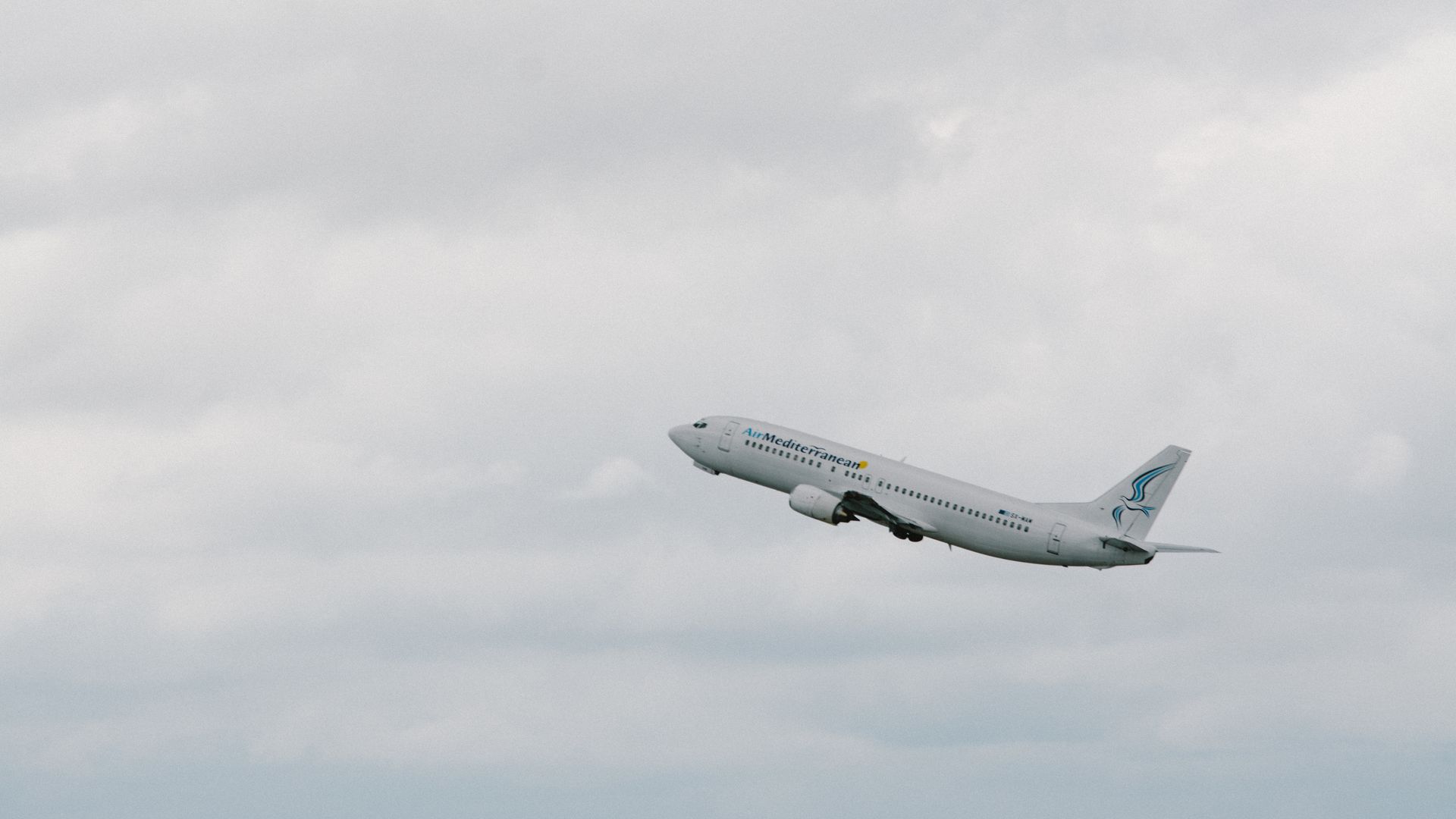 An airplane taking off into the air