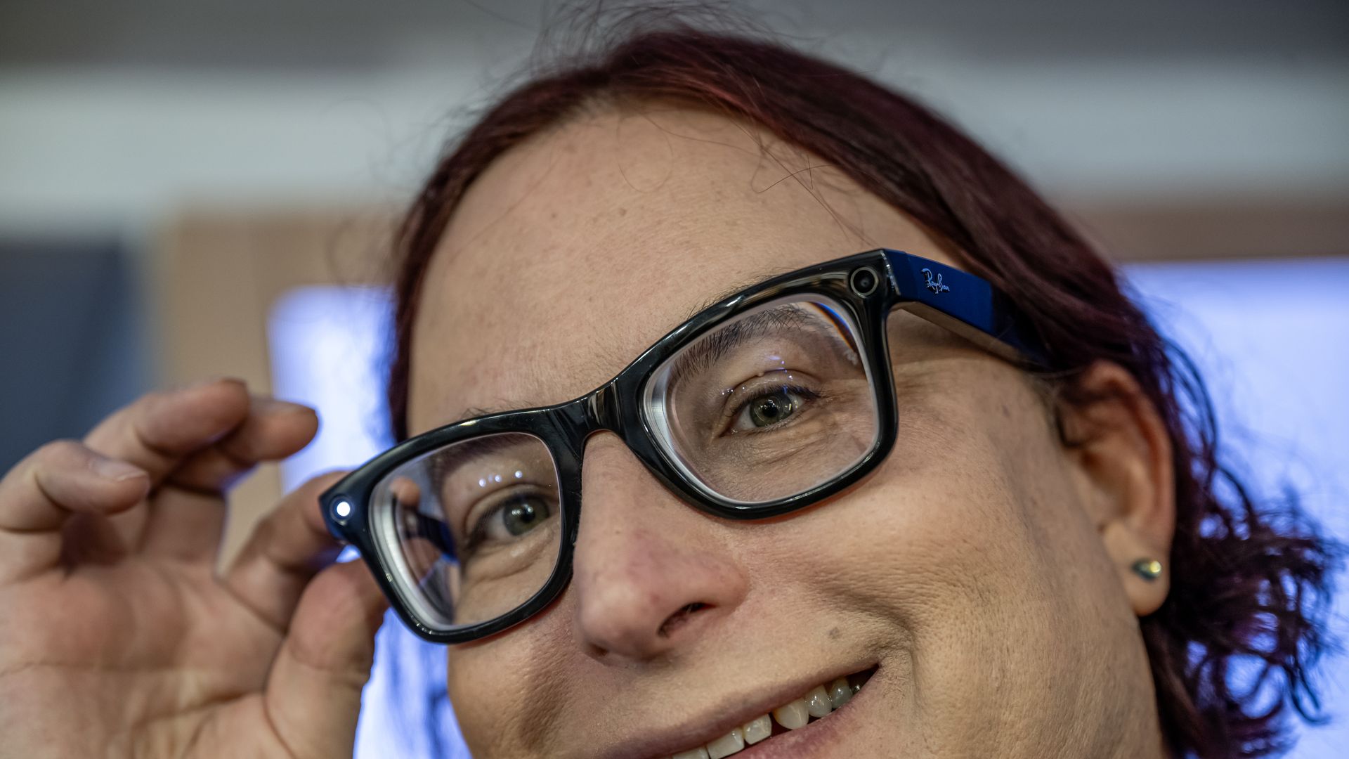 Axios Chief Technology Correspondent Ina Fried taking a picture with Meta's Ray-Ban Smart Glasses. 