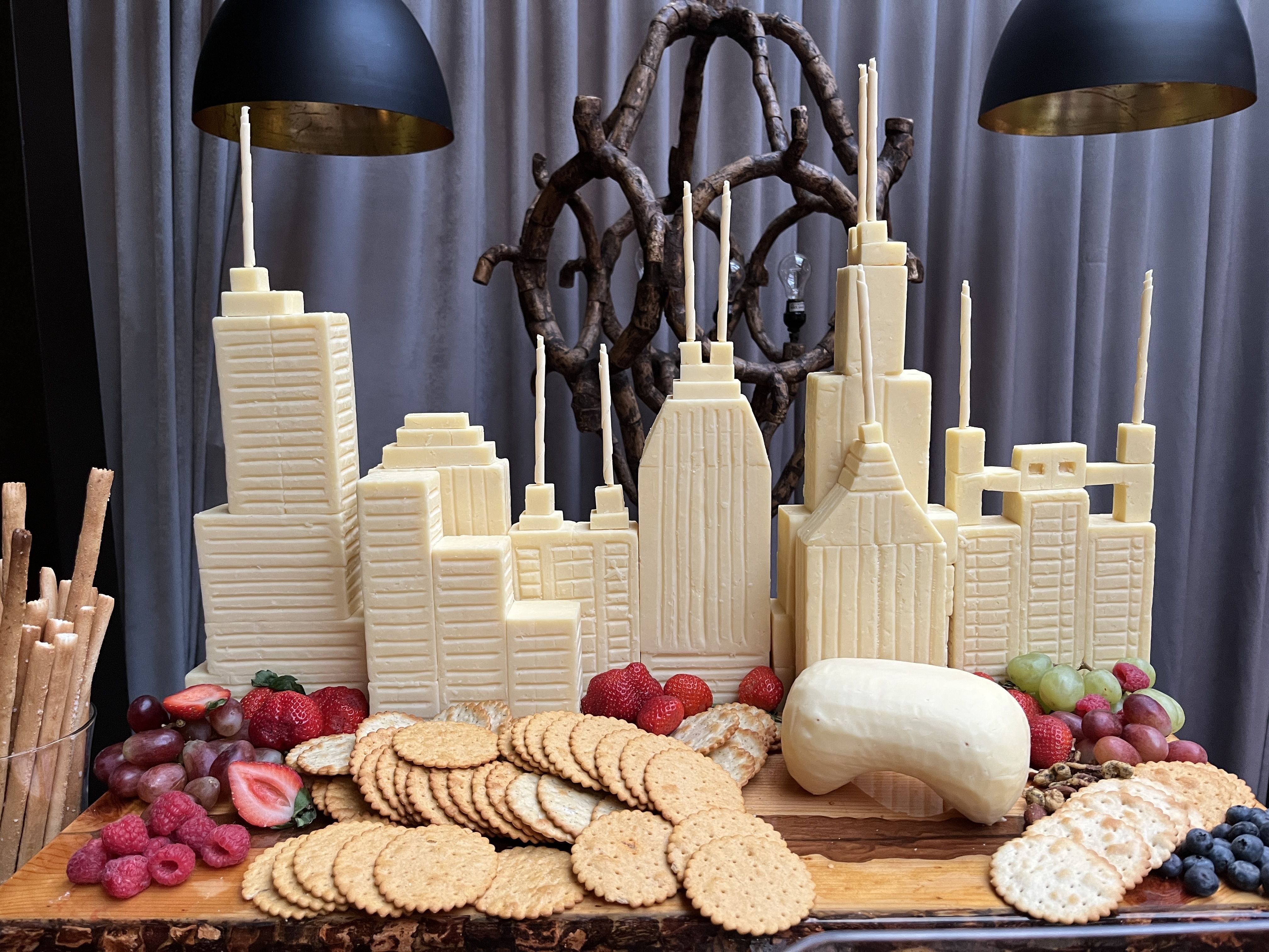 Skyline of white cheddar cheese at the Aldi charcuterie chalet pop up.