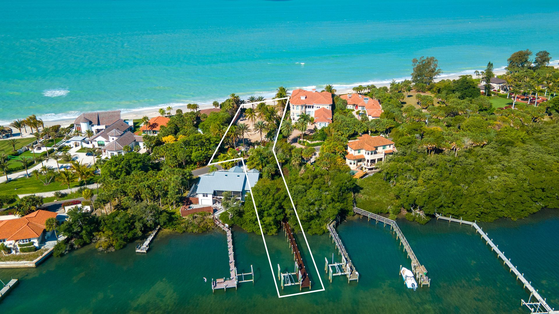 An aerial photo of an oceanfront undevelped property.