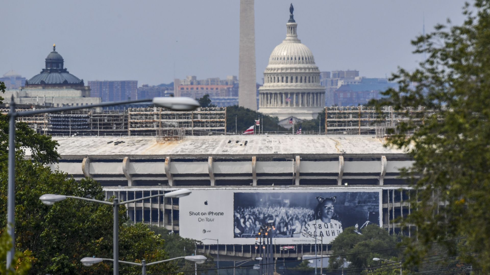 A view of RFK Stadium with the Capitol dome and Monument in the background
