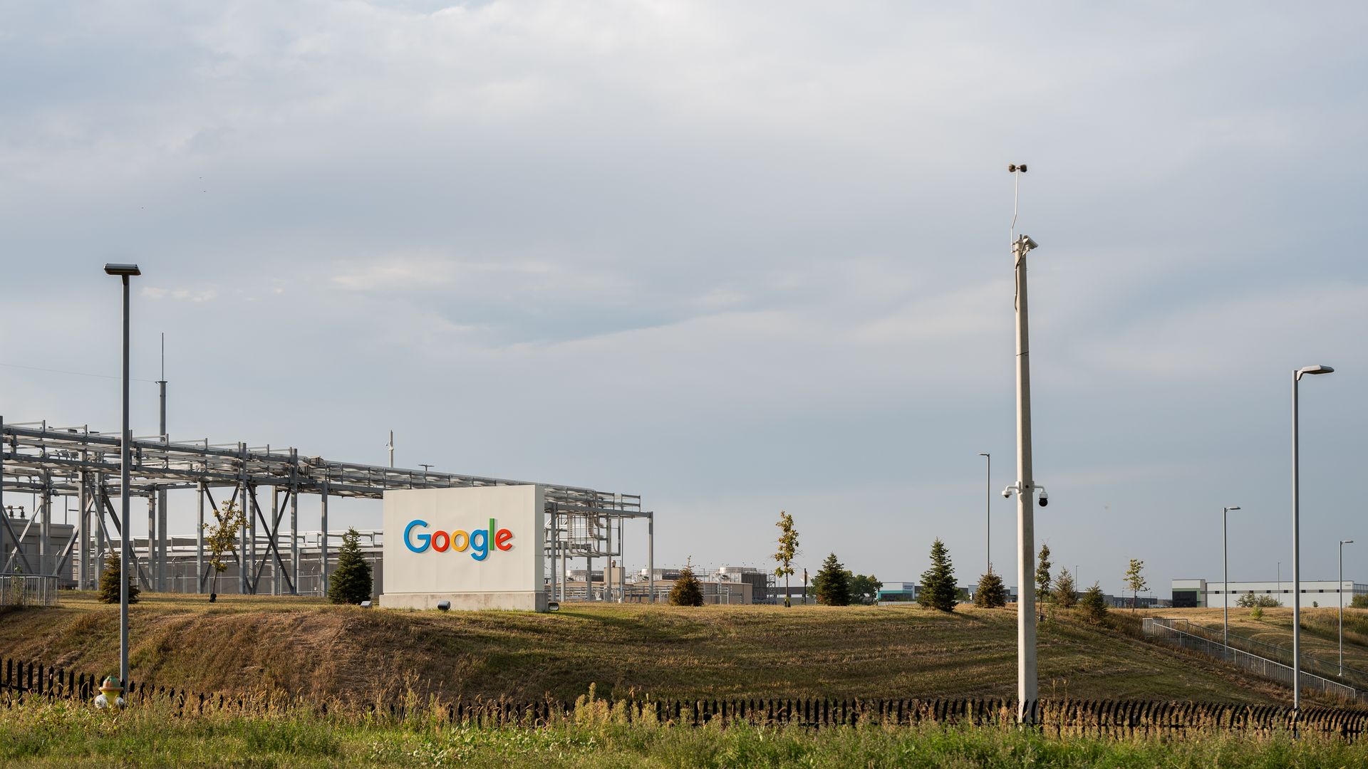 a google sign outside of metal fence 
