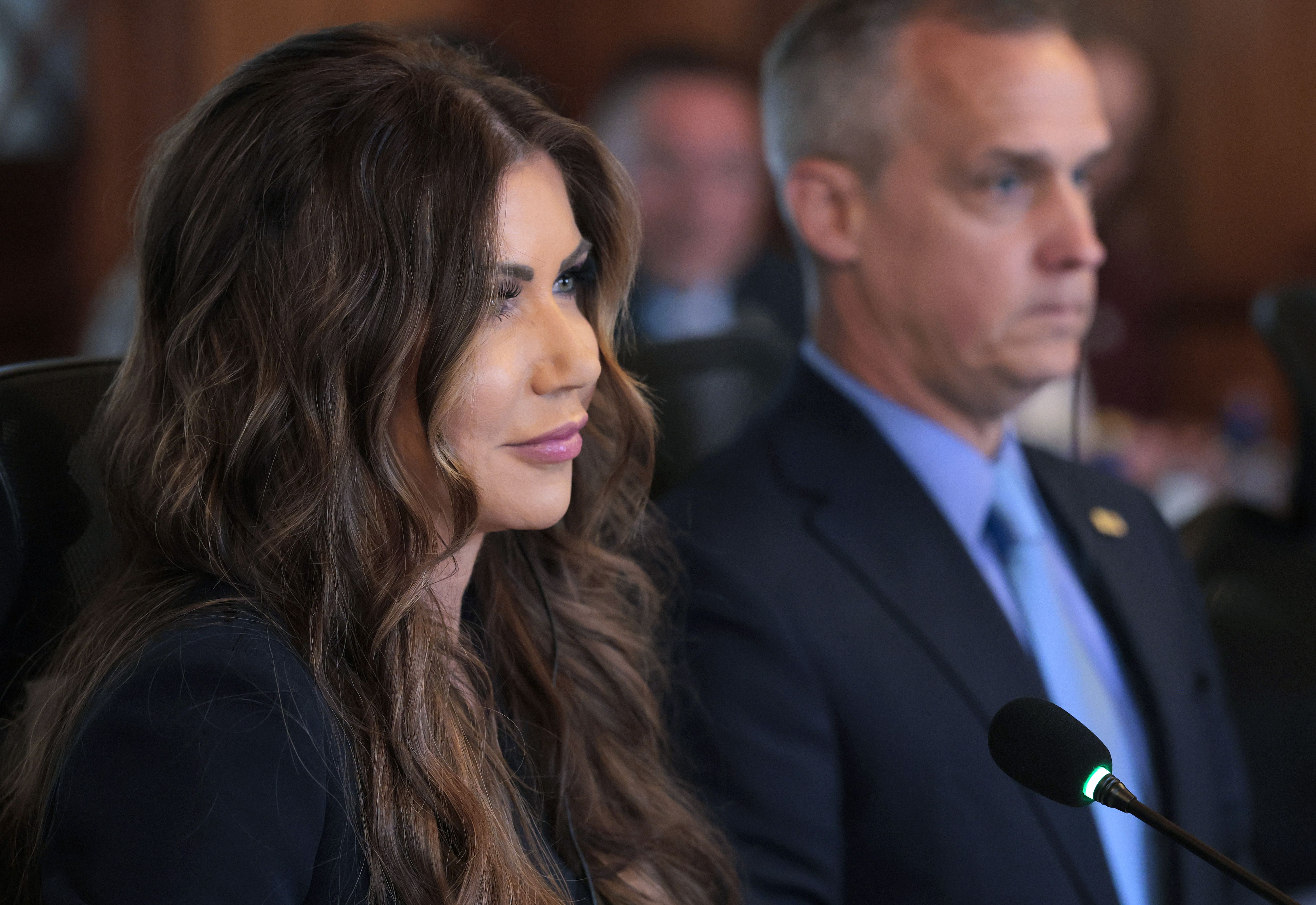 Homeland Security Secretary Kristi Noem and adviser Corey Lewandowski, during a visit to Guatemala in June. 