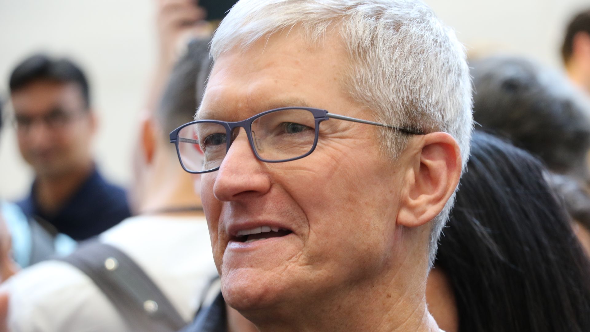 Apple's Tim Cook smiling
