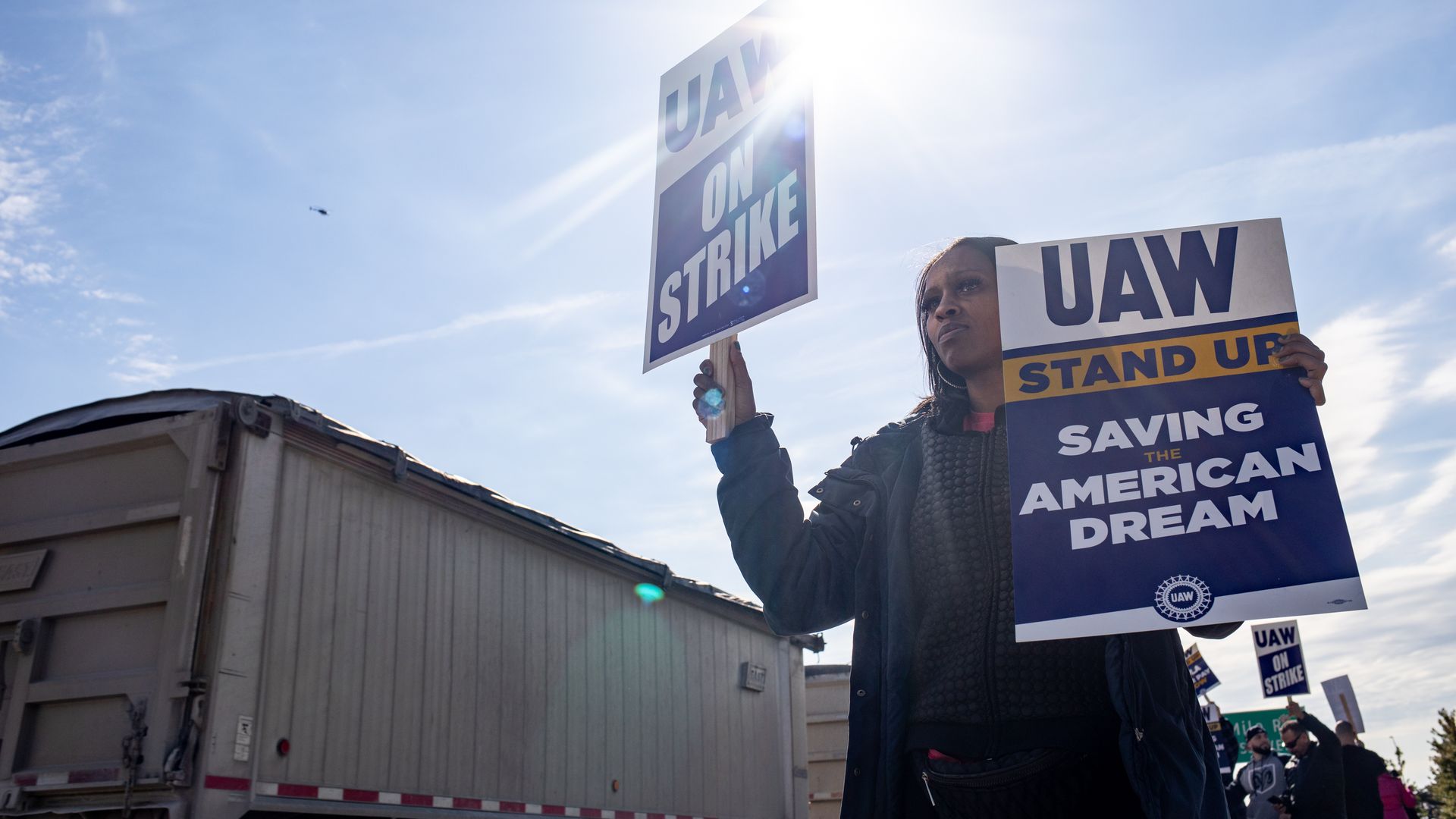 A UAW On Strike sign held on a picket line outside the Stellantis Sterling Heights Assembly Plant in Sterling Heights, Michigan, US, on Monday, Oct. 23, 2023.