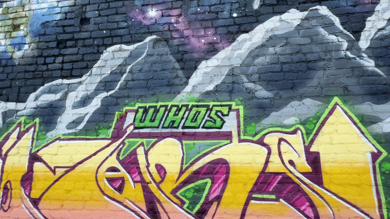 a video of a colorful space-themed mural