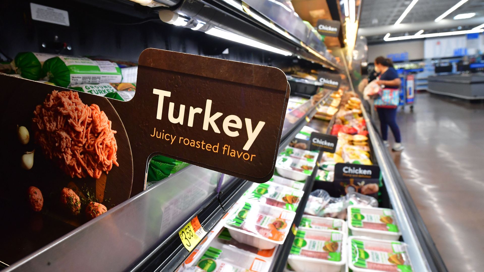 A photo of the meat section of a grocery store