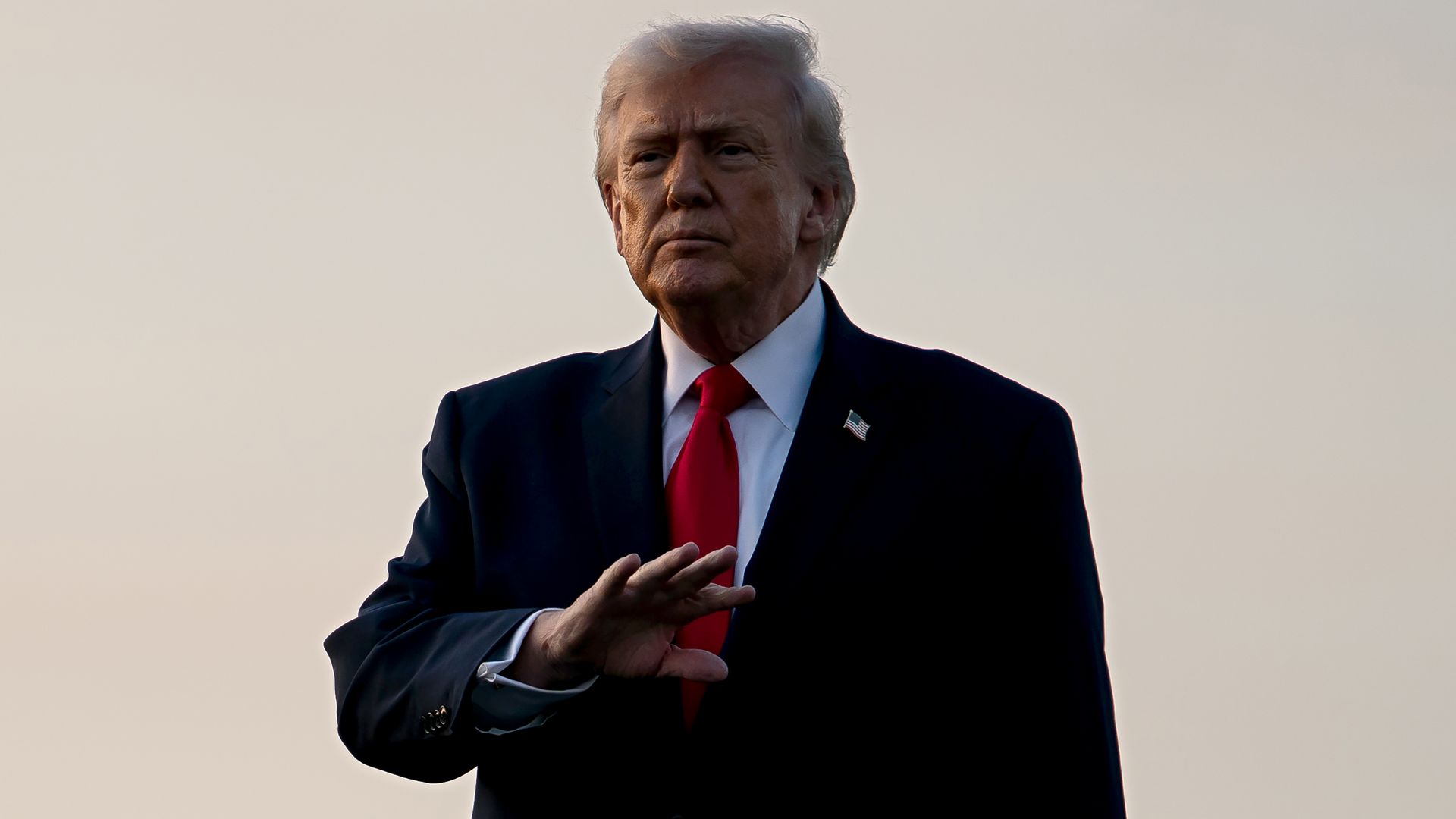 U.S. President Donald Trump gestures to members of the media after exiting Air Force One at Palm Beach International Airport on February 13, 2026 in West Palm Beach, Florida. The President is spending the weekend at Mar-a-Lago in Palm Beach, Florida. (Photo by Nathan Howard/Getty Images)