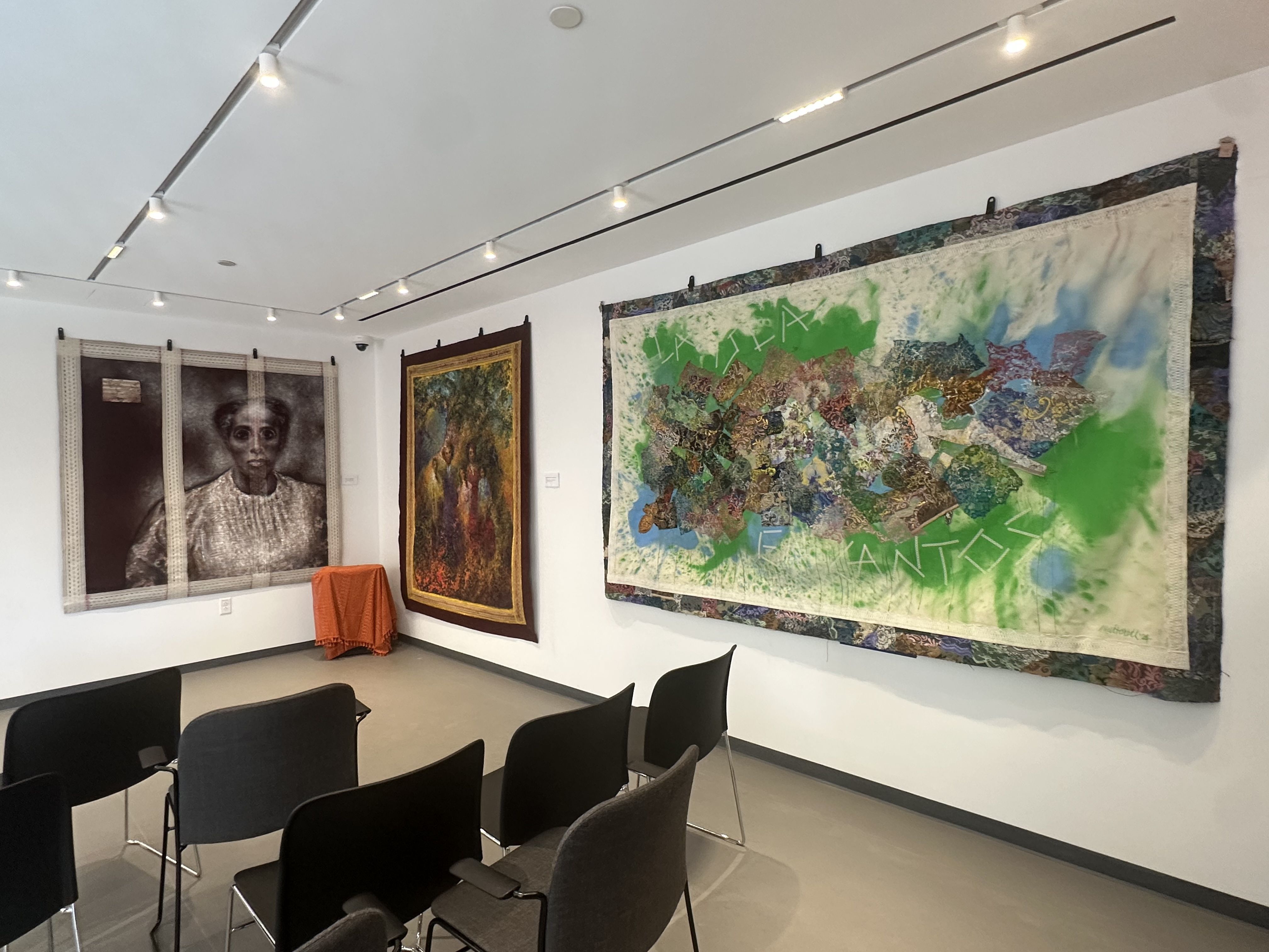 Three paintings on fabric by Puerto Rican artist Antonio Martorell hang on the second floor of La CASA, a new arts and community center in the South End. 
