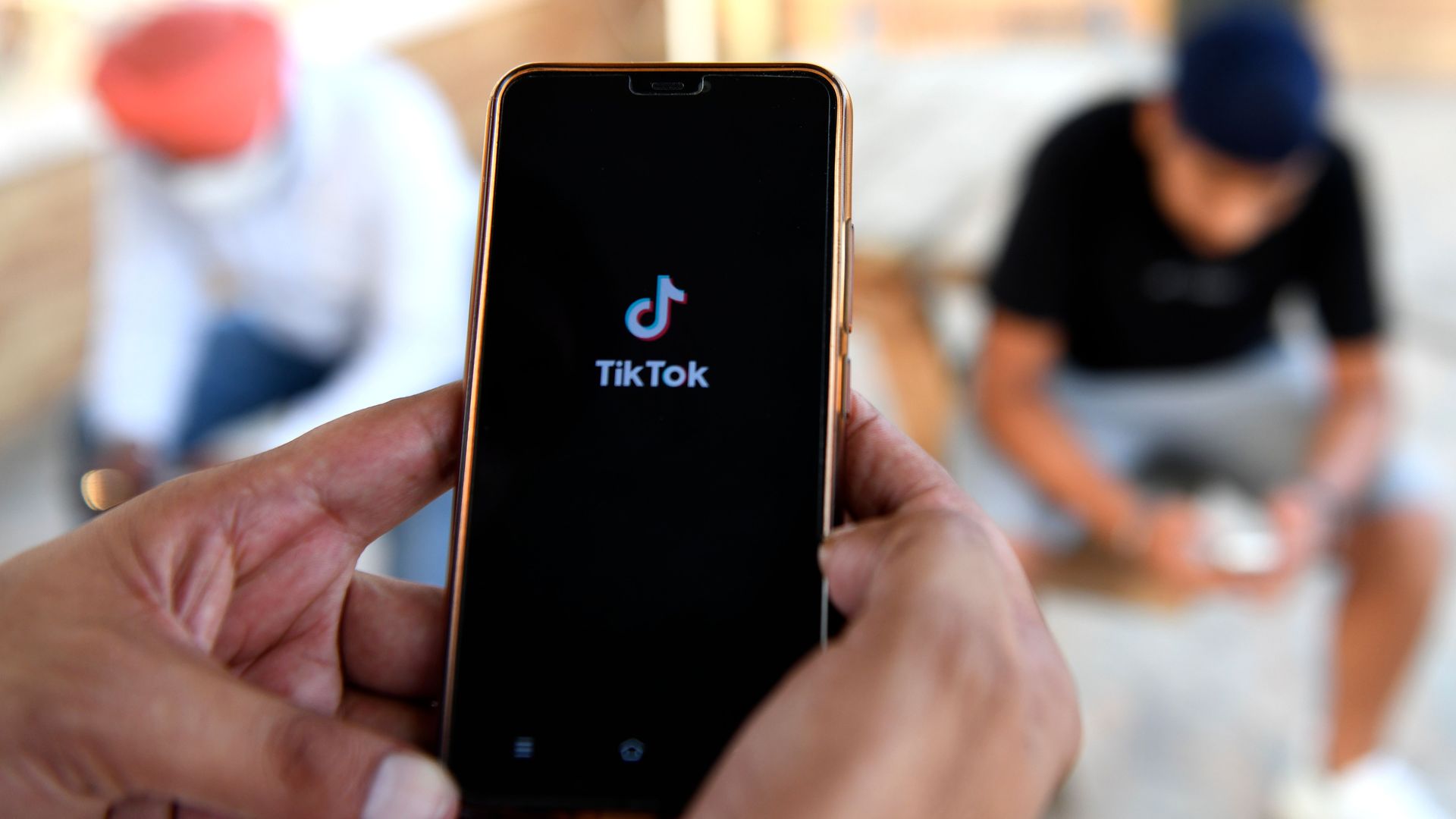 Indian mobile users browses through the Chinese owned video-sharing 'Tik Tok' app on a smartphones in Amritsar on June 30, 2020.