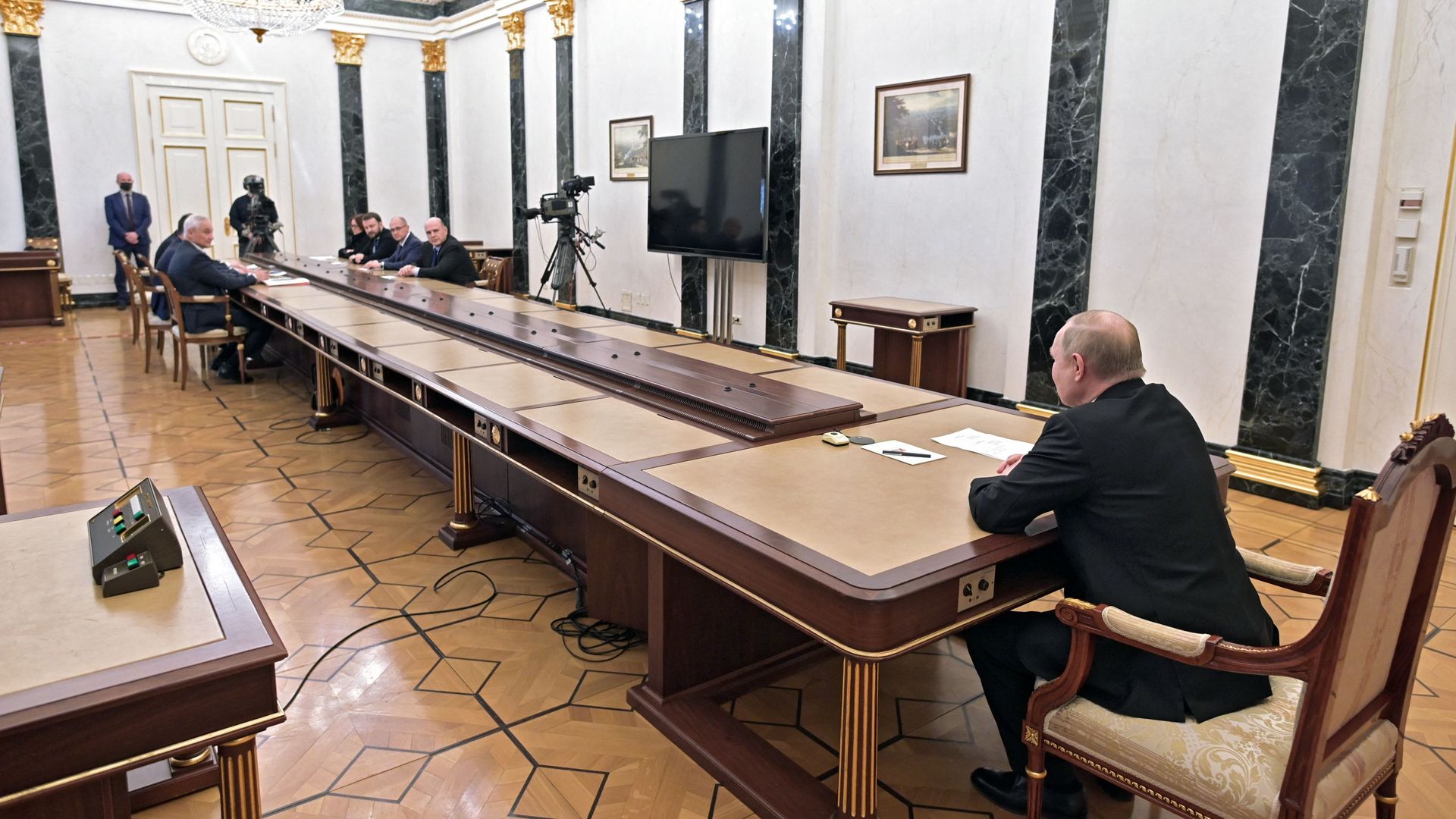 Vladimir Putin chairs a meeting on economic issues at the Kremlin yesterday.