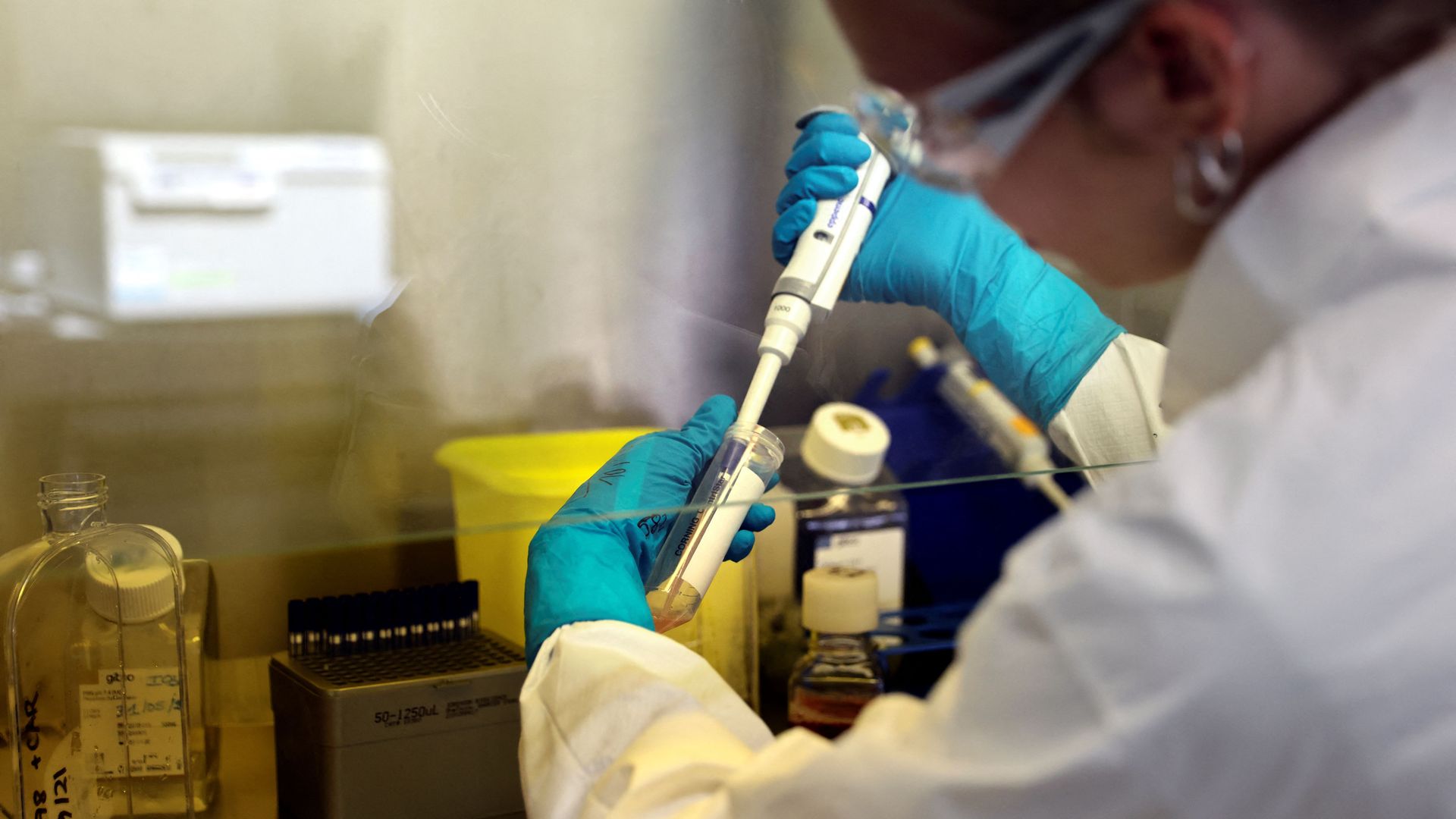 A lab technician works on a research process to find new CAR-T cells and RNA in the laboratory of French biopharmaceutical company Cellectis in Paris on September 23, 2021.