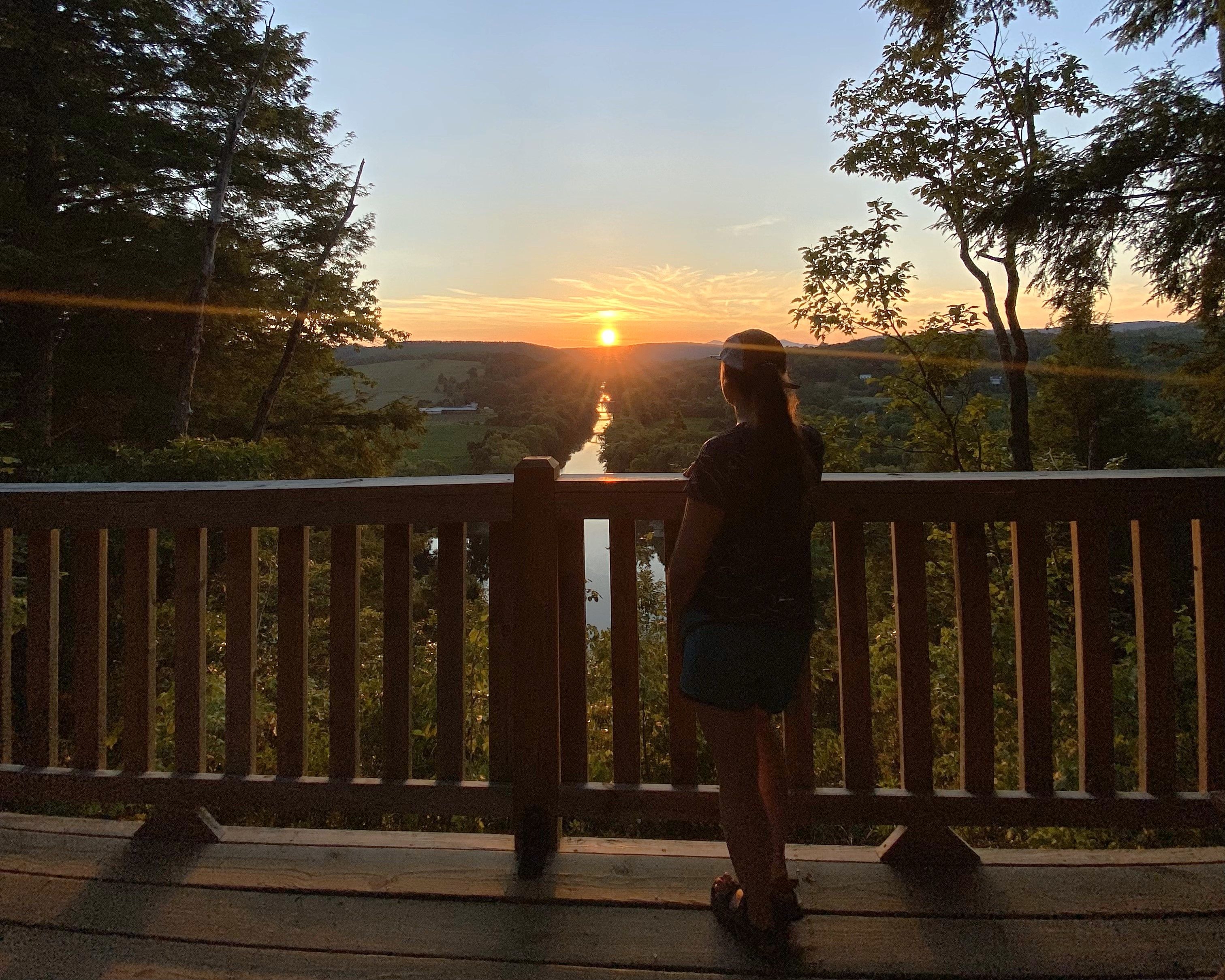 A person watching the sunset 