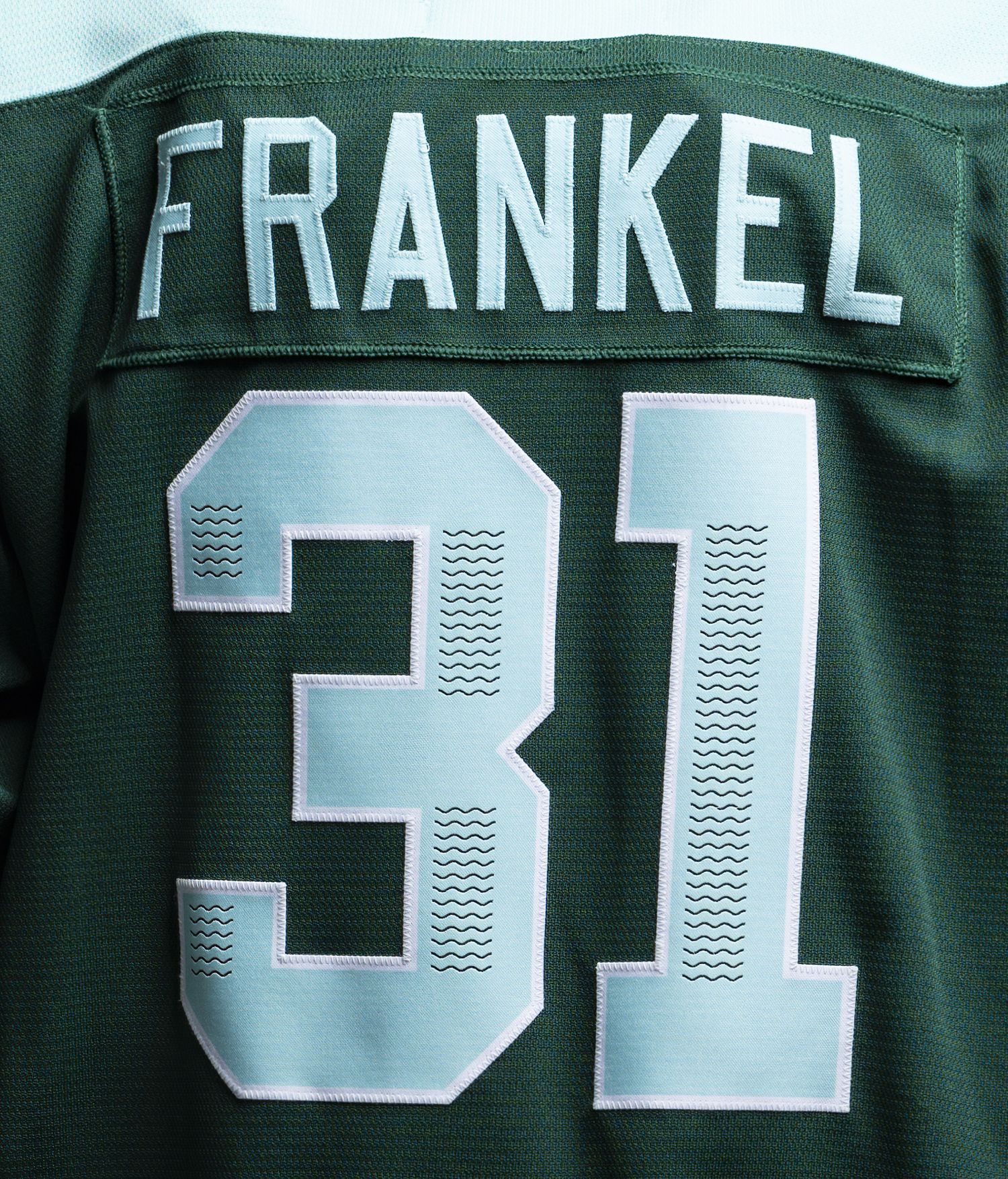 A Boston Fleet jersey, which is green, and has the number 31 on it.