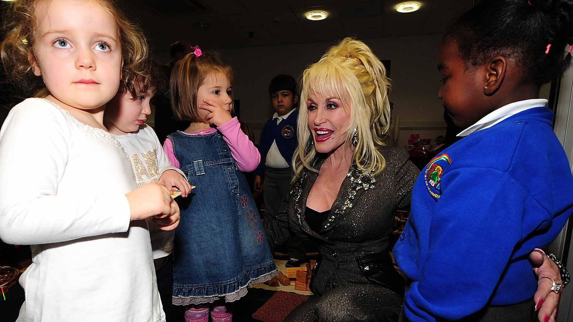Dolly Parton speaks to children at the launch of the Imagination Library program in the U.K. in 2007.