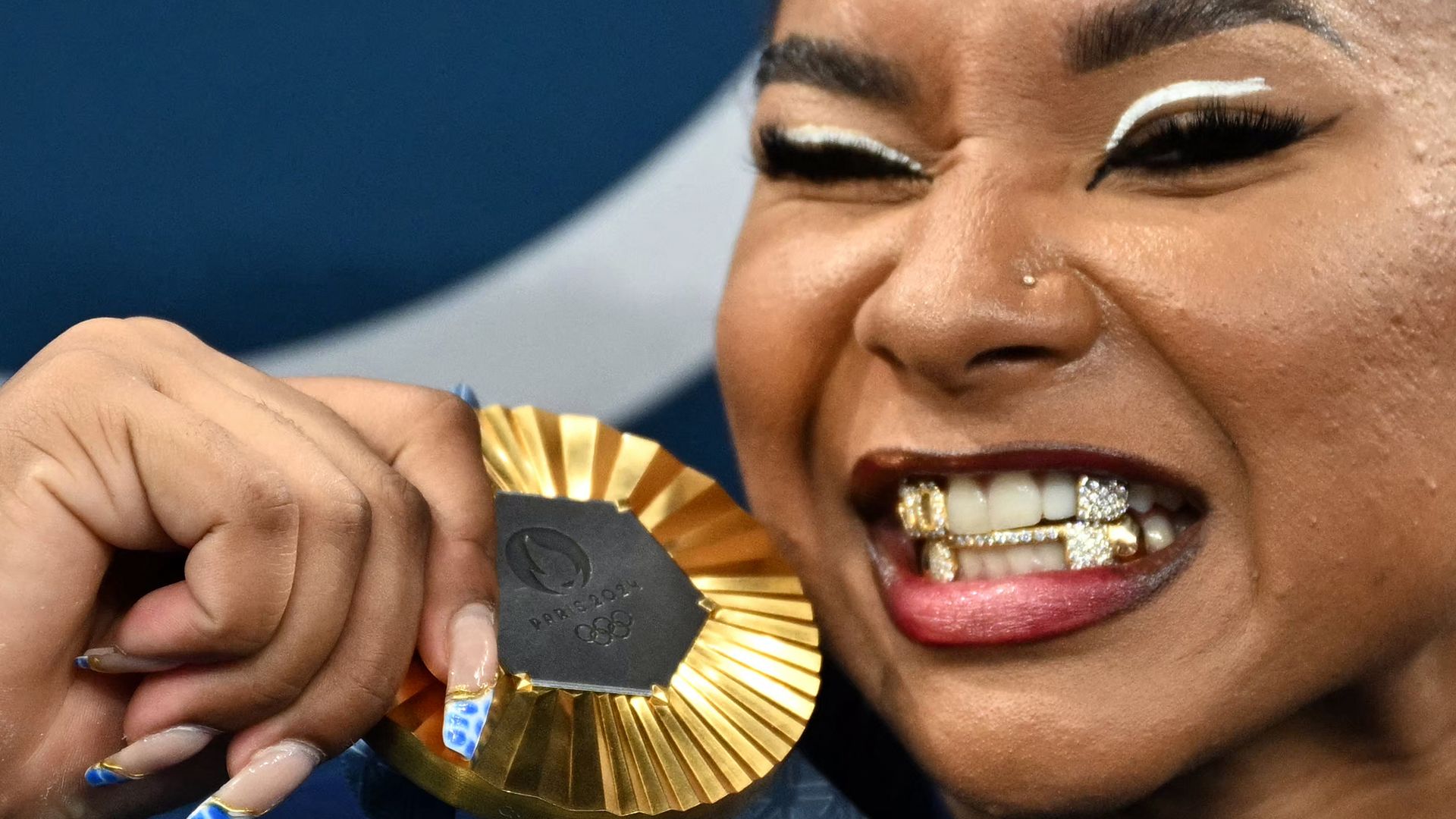 US' Jordan Chiles poses with the gold medal after the podium ceremony for the artistic gymnastics women's team final during the Paris 2024 Olympic Games at the Bercy Arena in Paris, on July 30, 2024.