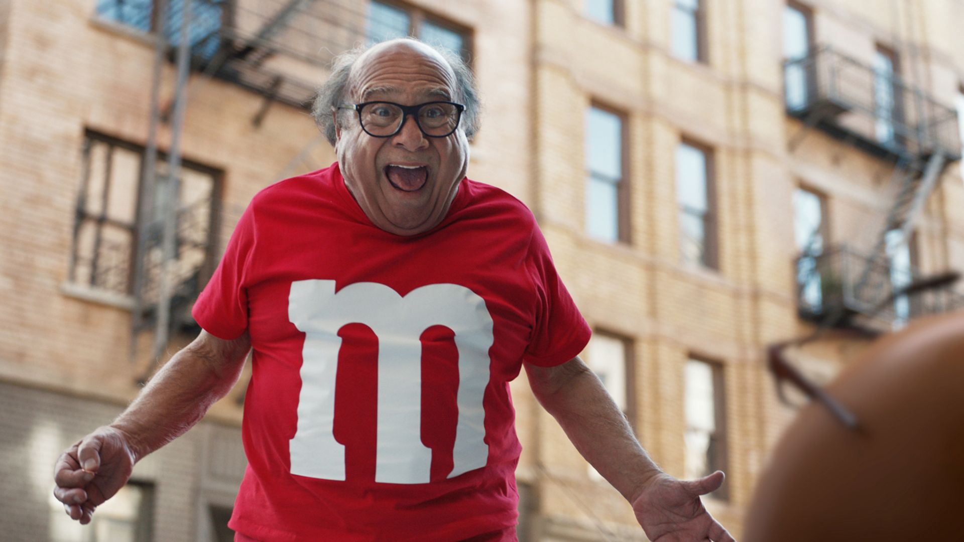 Photo of Danny DeViot in Super Bowl ad for M&M's