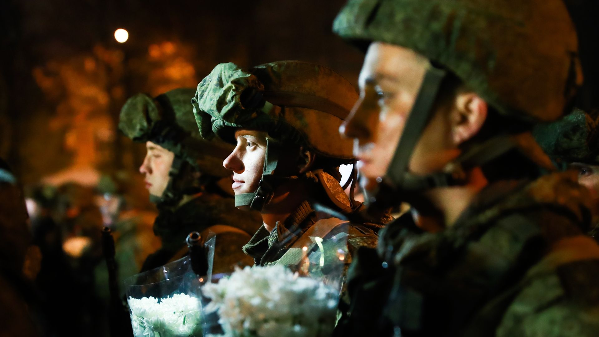 Russian troops stand in a lineup.